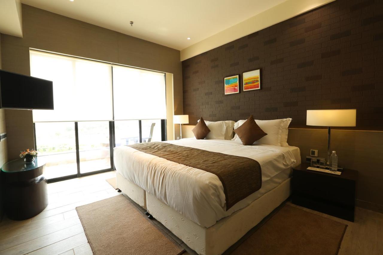 Deluxe Room with One king Bed - City or Garden View - Non-Smoking - 15% Discount on Food & Beverages, 20% Discount on SPA, Comp Early Check-in / Late Check-out upto 2 hours (Subject to availability) - Comp upgrade (Subject to availability)