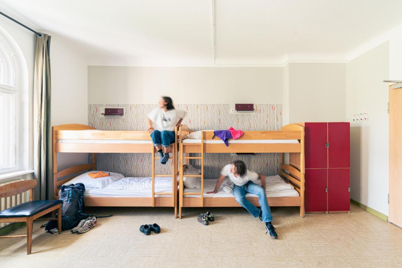 Single Bed in 4-Bed Dormitory Room with Shared Bathroom