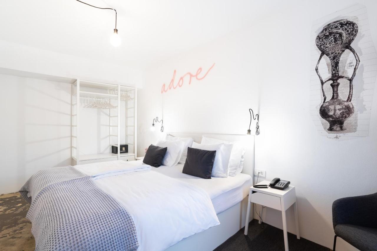 Deluxe Double Room with Balcony and City View