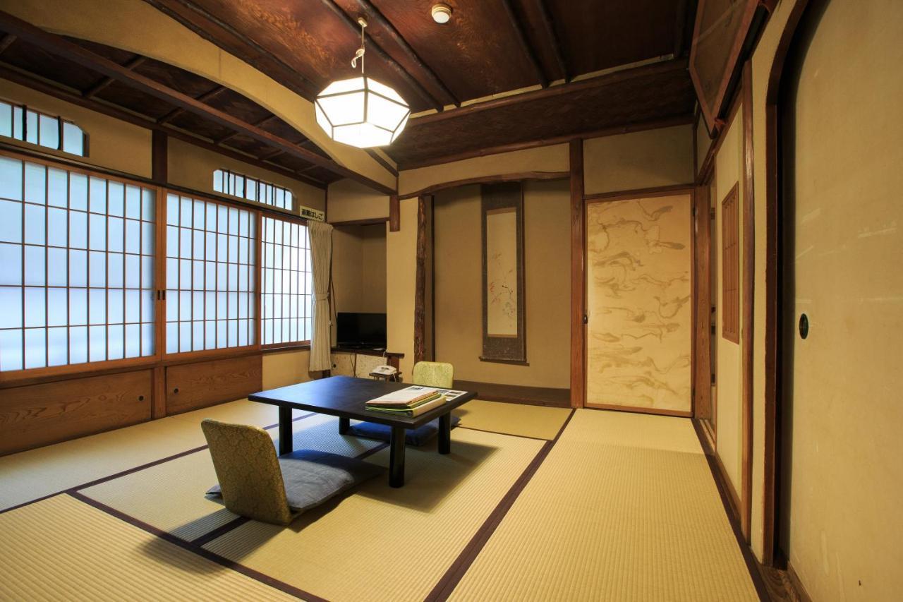 Quadruple Room with Shared Bathroom