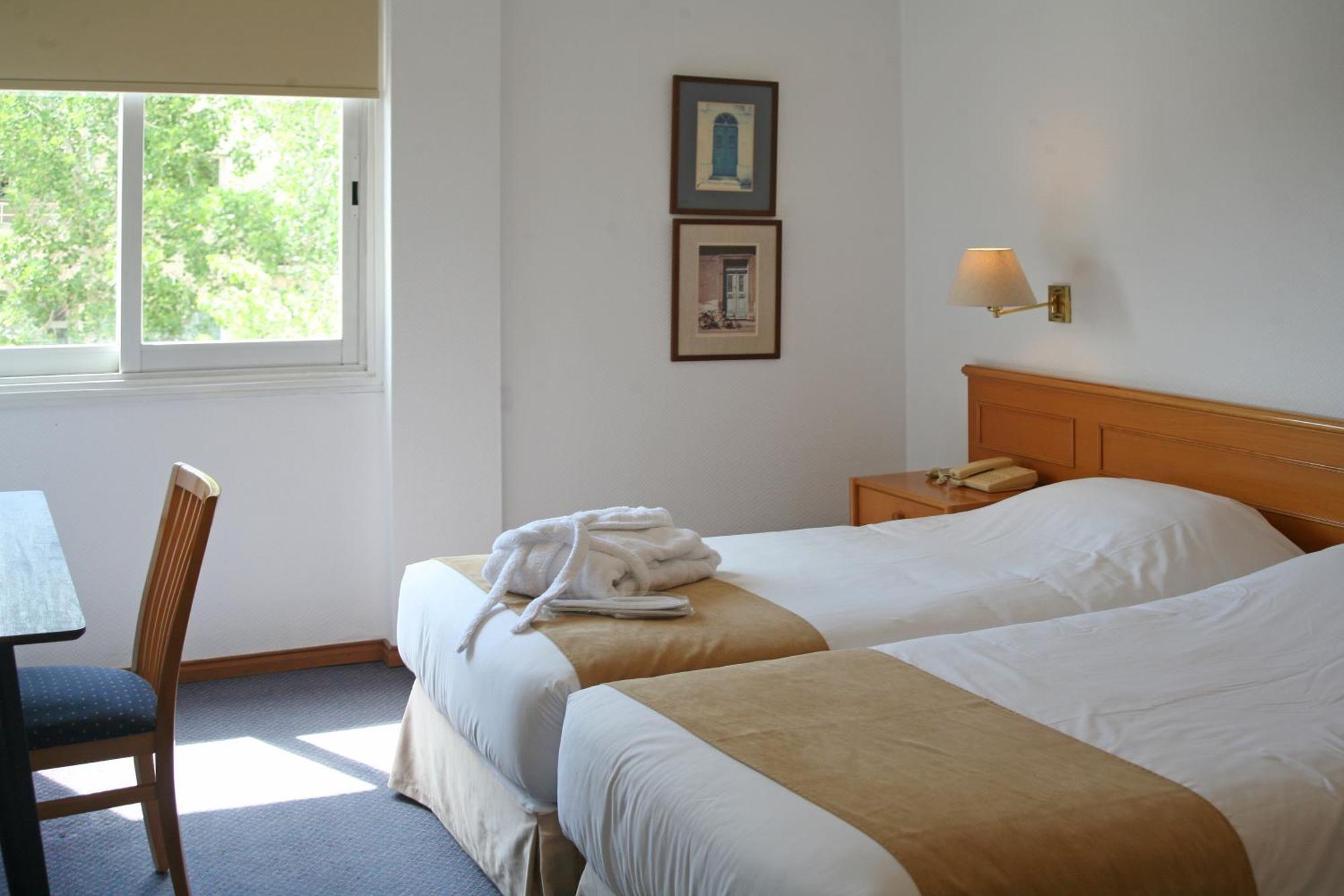 One-Bedroom Apartment with Side Sea View