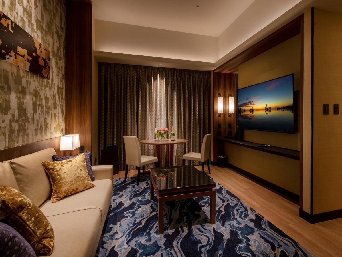 Celebration Suite with Elegant Red & Gold Balloon Decoration