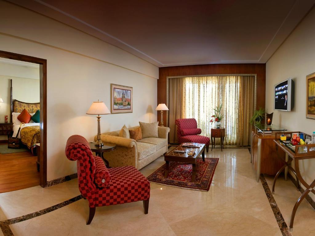 Lalit Executive Suite, King Bed with 15% off on Session on Spa , Complimentary Airport Drop to T1 & T2 and Enjoy Happy Hours with 1+1 offer on Beverages