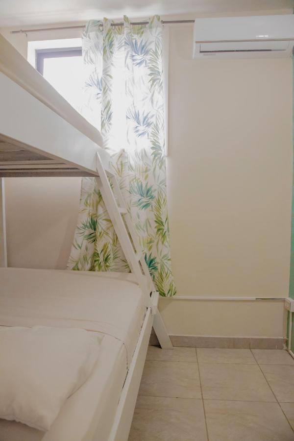 Basic Triple Room with Shared Bathroom