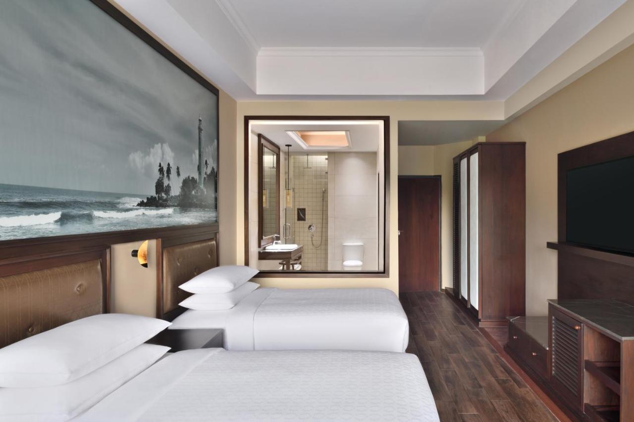 Deluxe Guest room, 2 Twin/Single Bed(s), Garden view, Balcony
