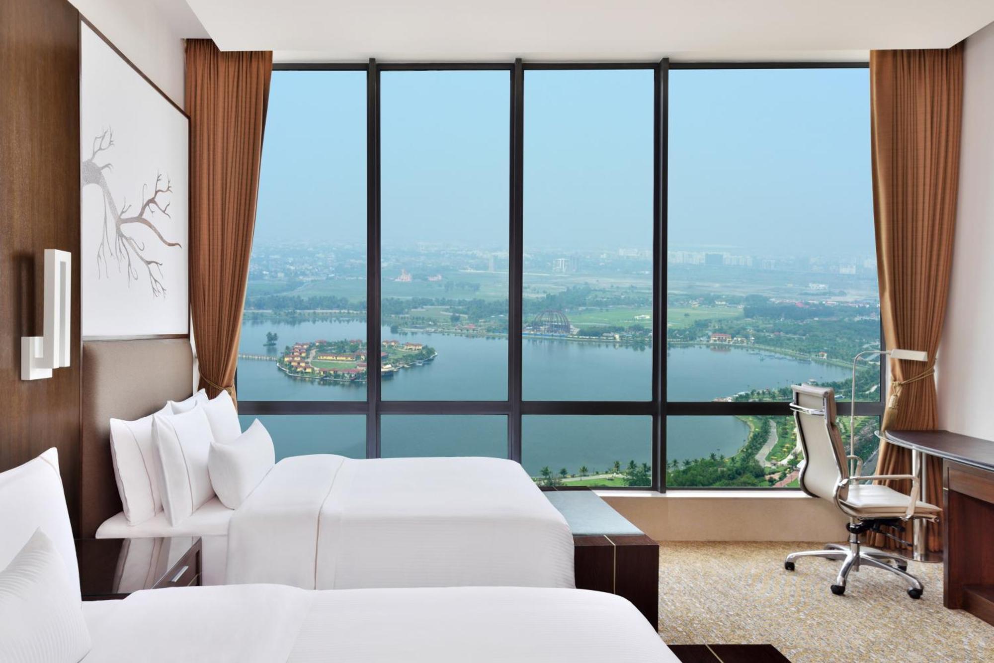 Deluxe Twin Room With Bathtub - INR 1,200 Hotel Credit per stay, 20% F&B Discount & Happy Hours (1 + 1 IMFL - 4 pm to 8 pm at 31/32)