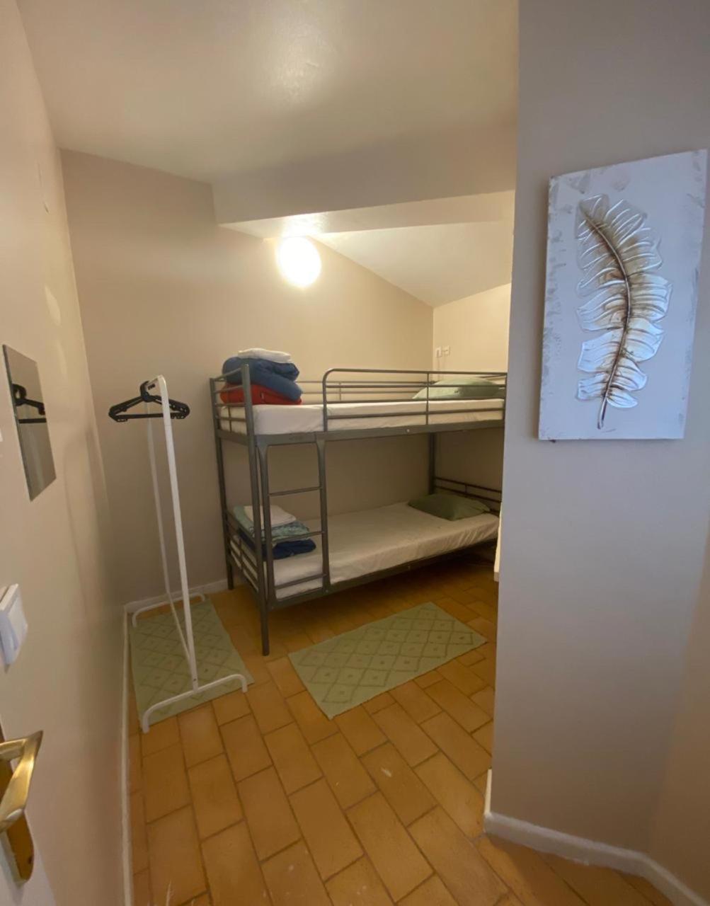 Single Bed in Dormitory Room