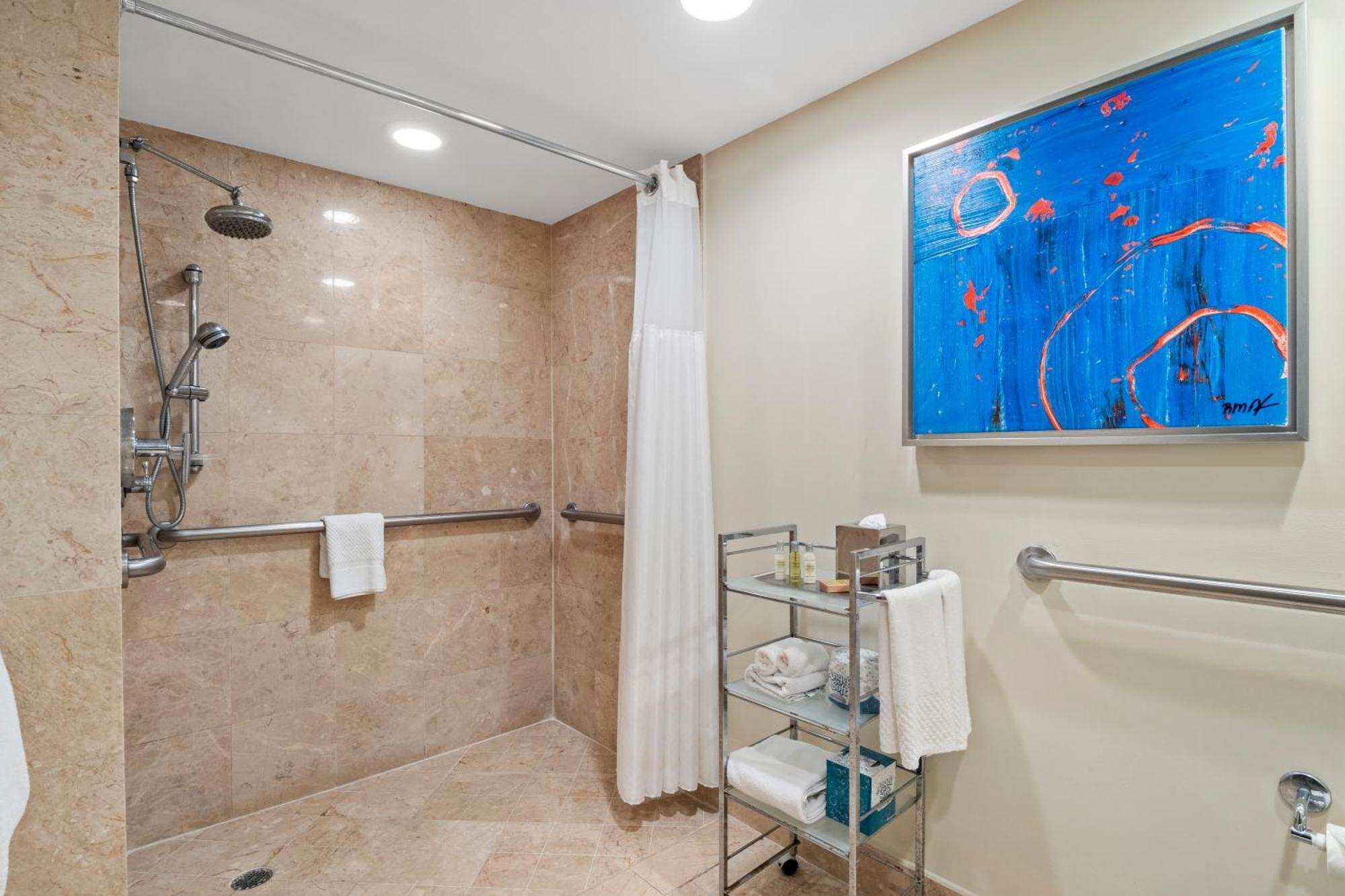 King Suite with Roll in Shower Water View
