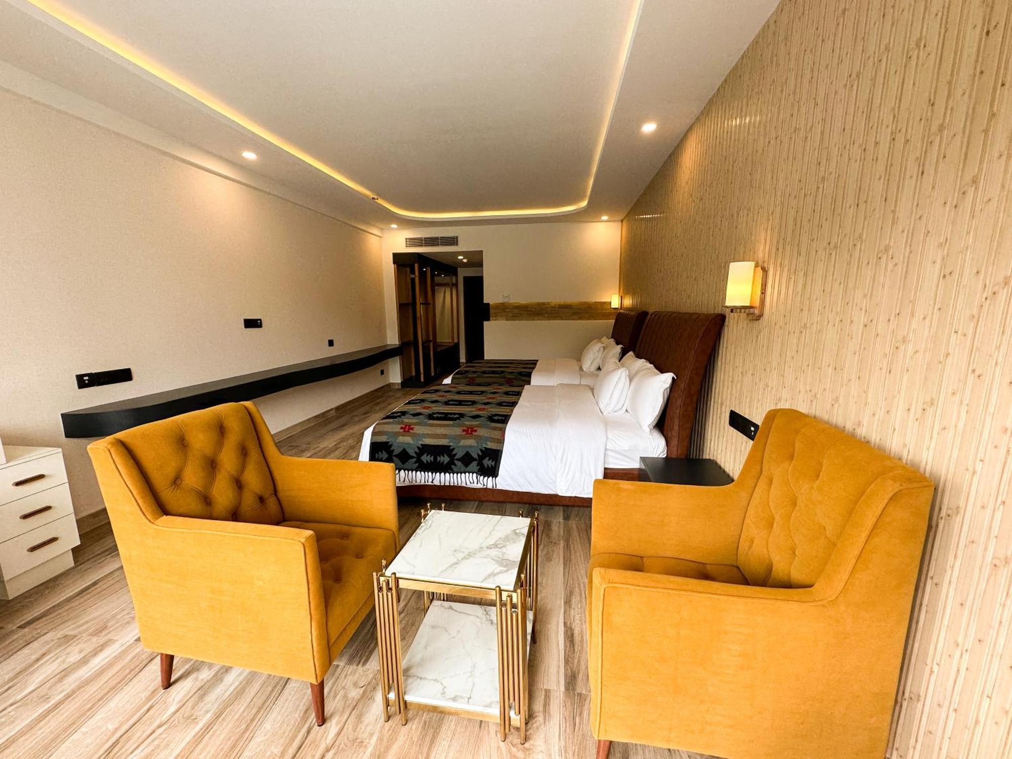 Luxury King Room or Two Queen Bedroom with Balcony and Pool View