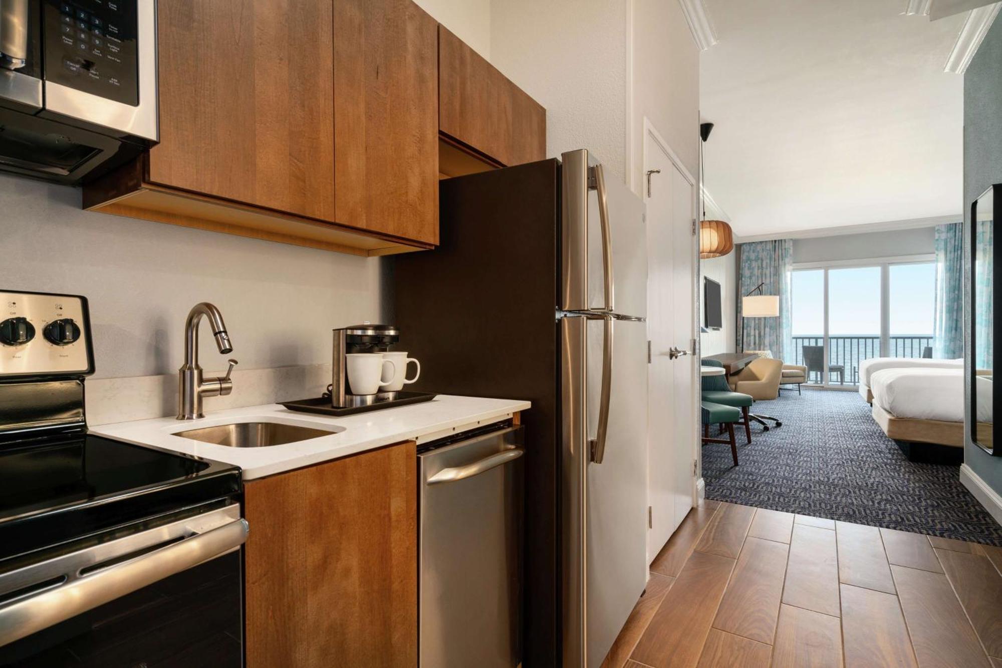 Double Queen with Kitchen, Balcony, and oceanfront view