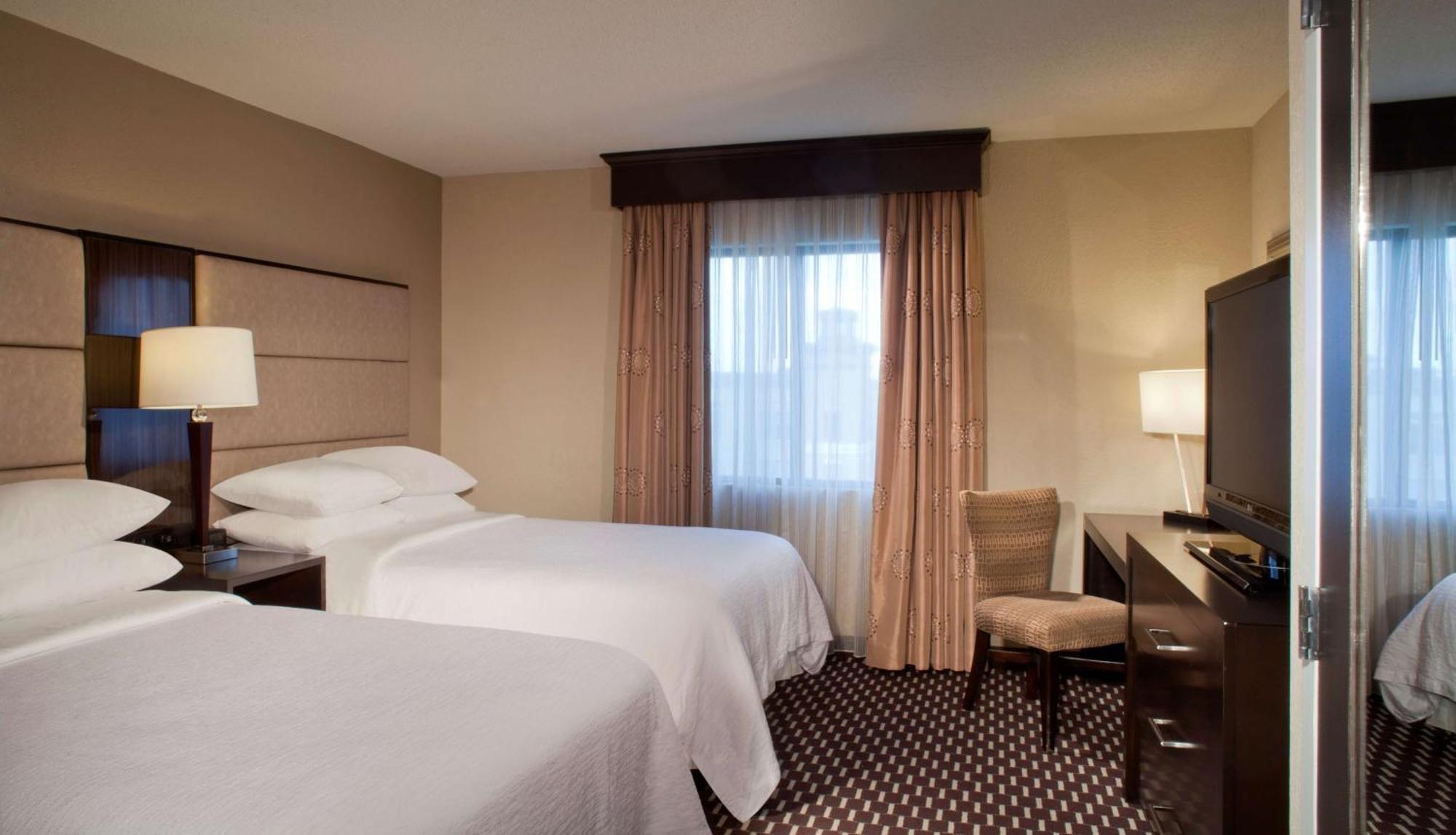 Corner Suite with Two Double Beds and Bath Tub - Mobility Accessible