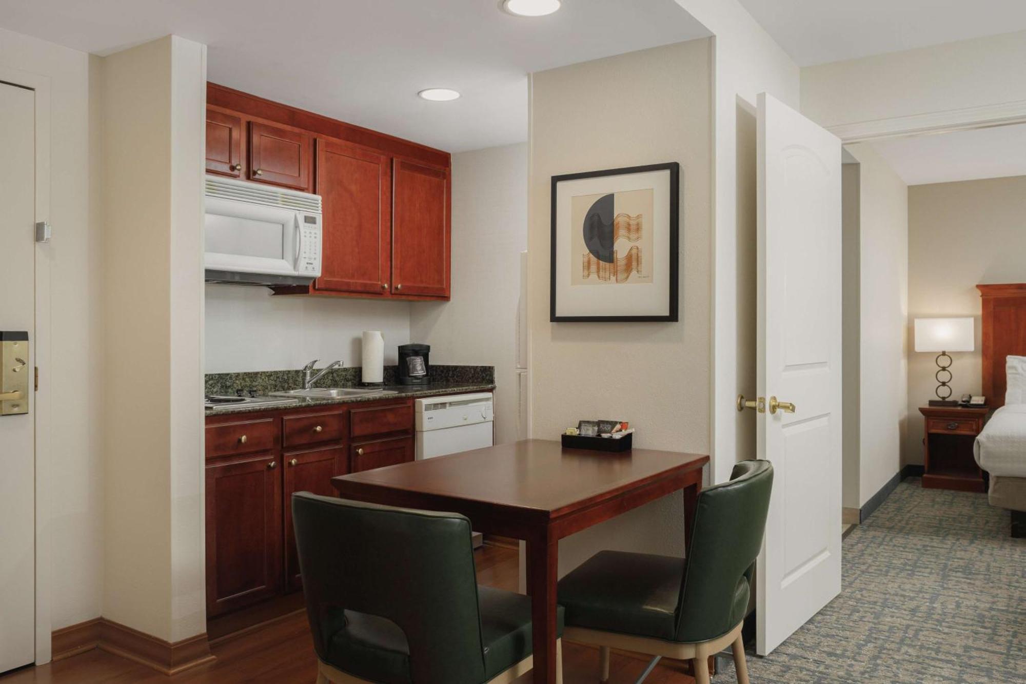 Two-Bedroom Suite with One King Bed and Two Queen Beds