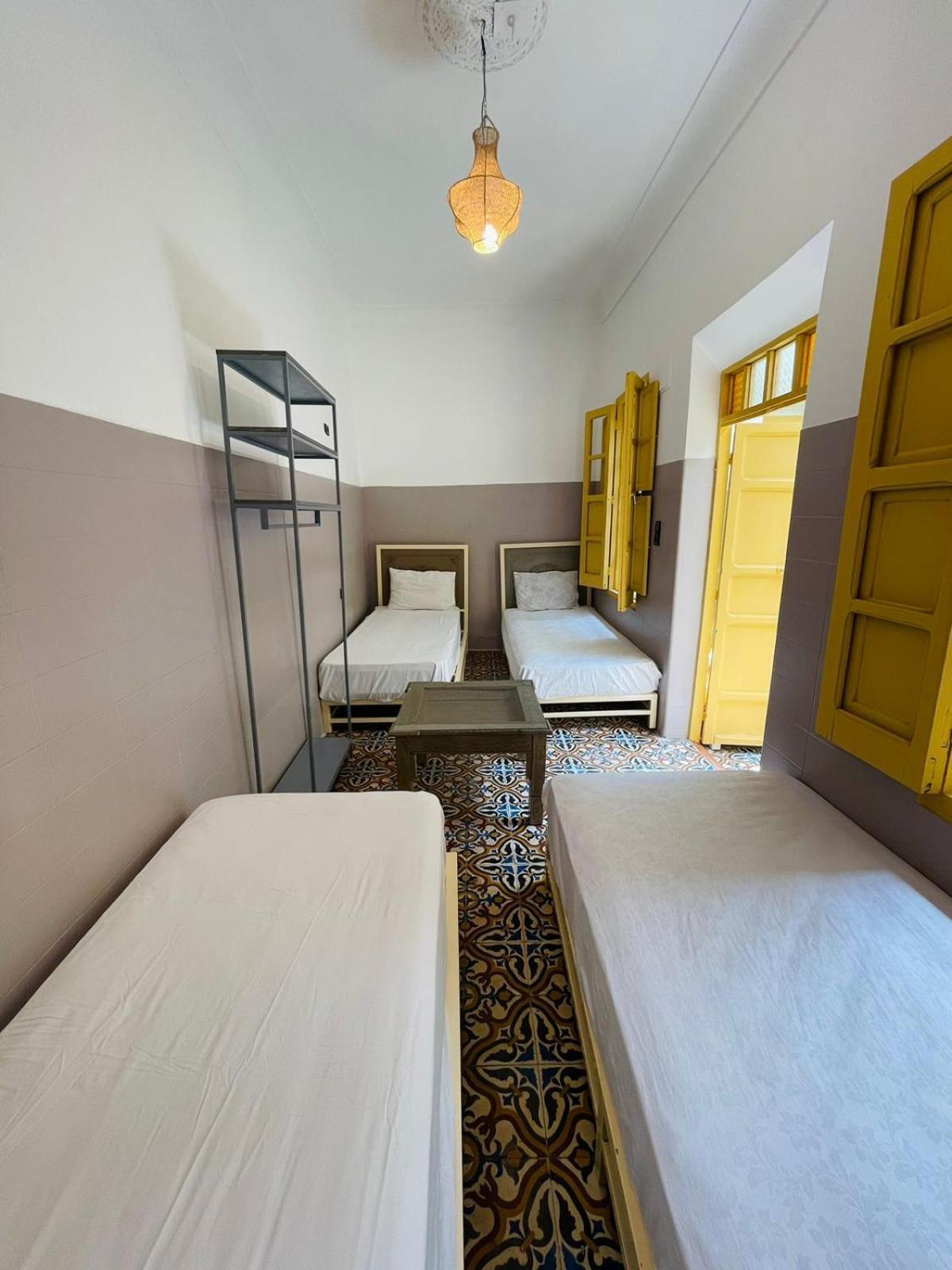 Economy Quadruple Room with Shared Bathroom