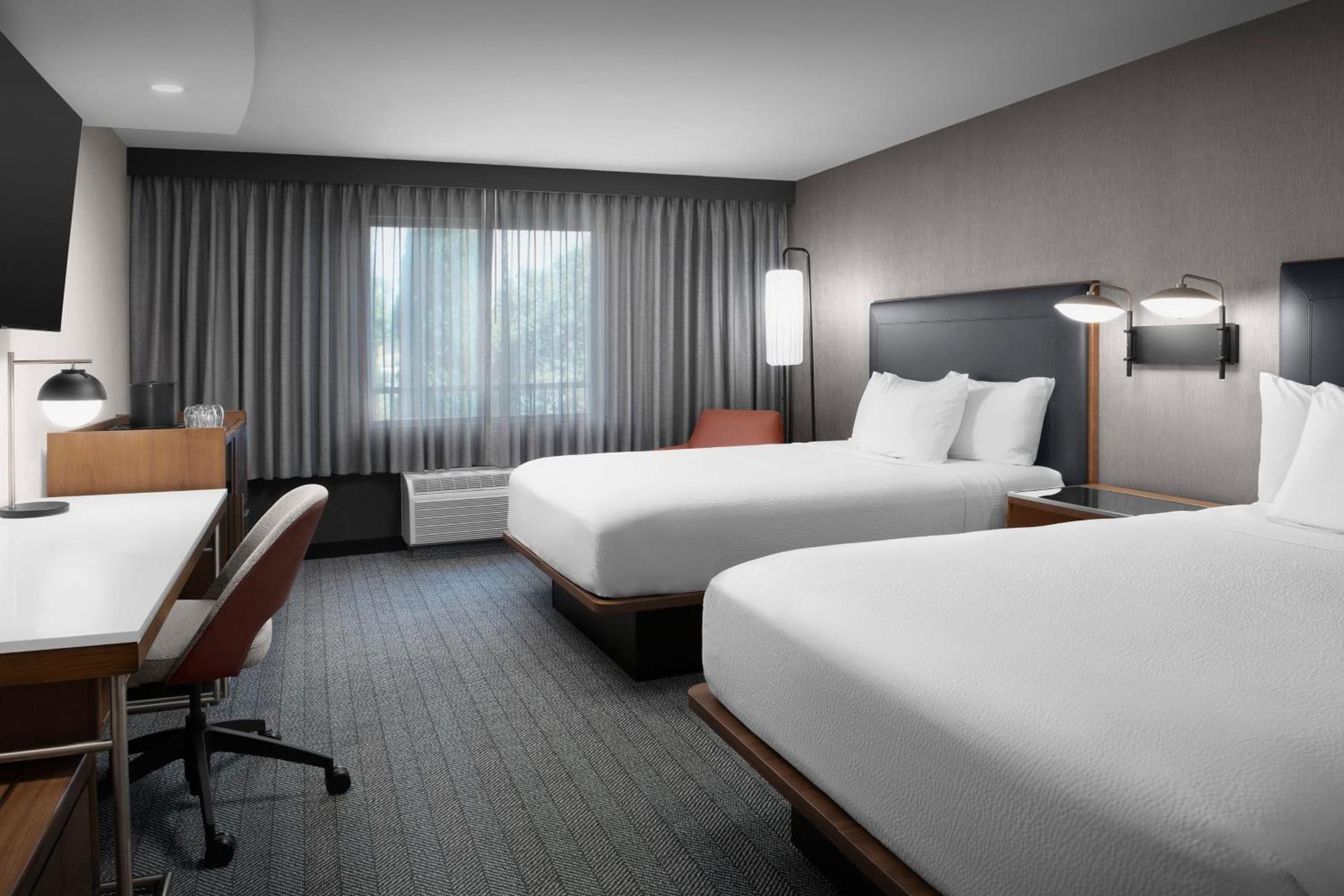Queen Room Two Queen Beds Roll Shower Mobility Access or Hearing Accessible