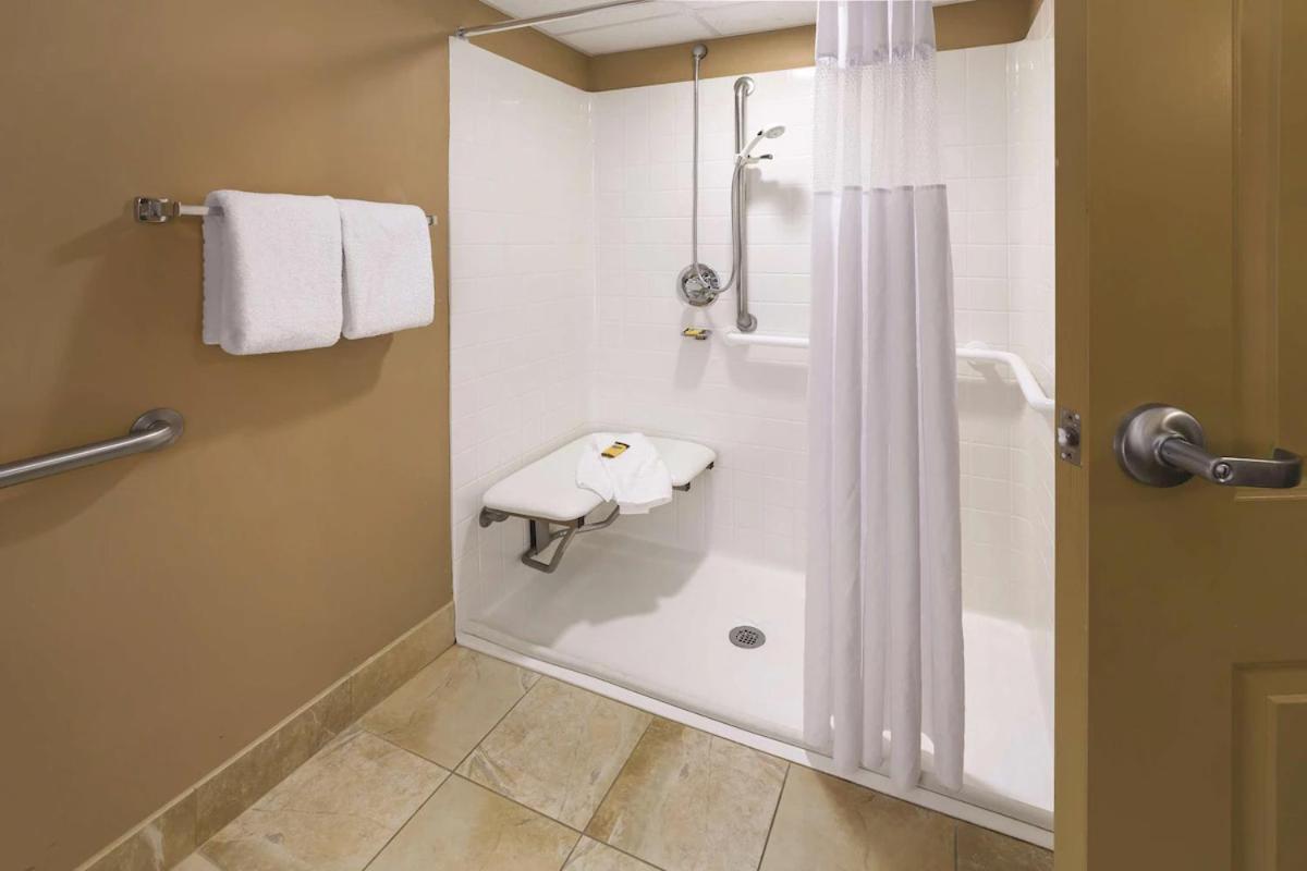 King Room with Roll In Shower and Pool View - Mobility/Hearing Accessible - Non-Smoking