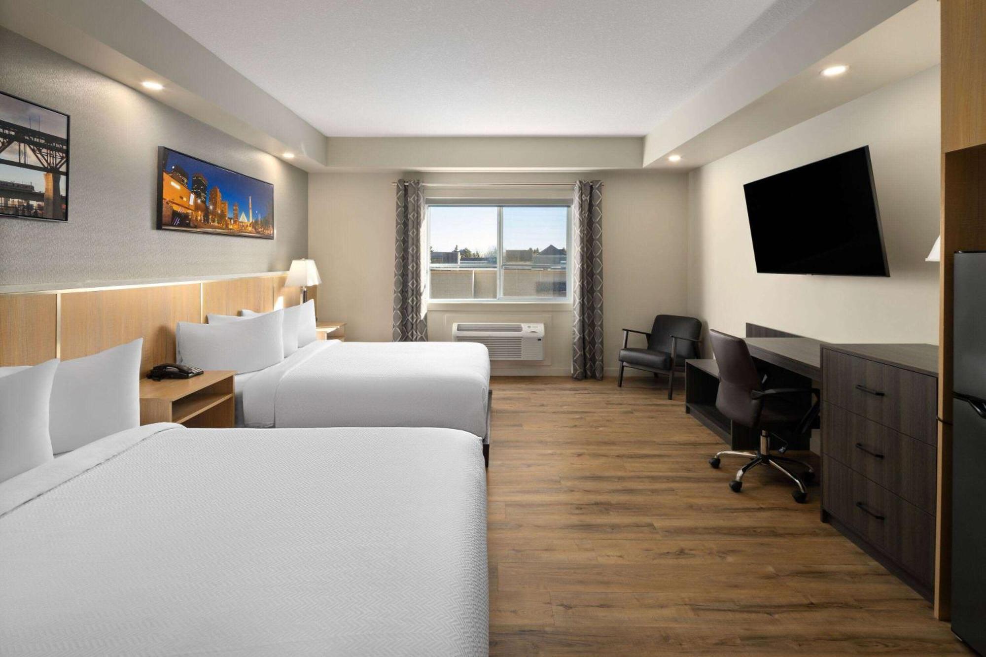 Queen Room with Two Queen Beds, Mobility Access and Roll-In shower, Non-Smoking