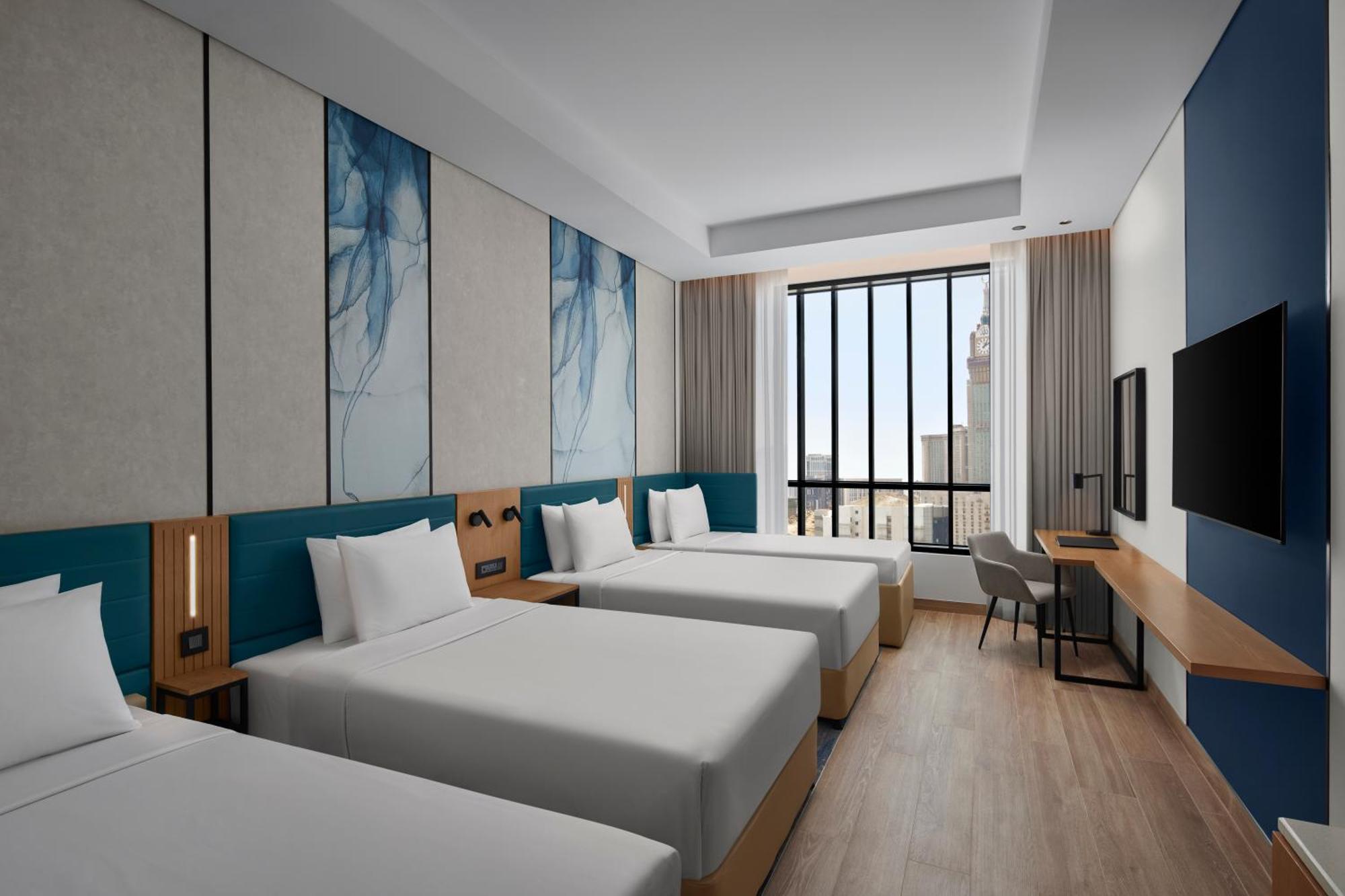 Premium Quadruple Room with Four Twin Beds and City View