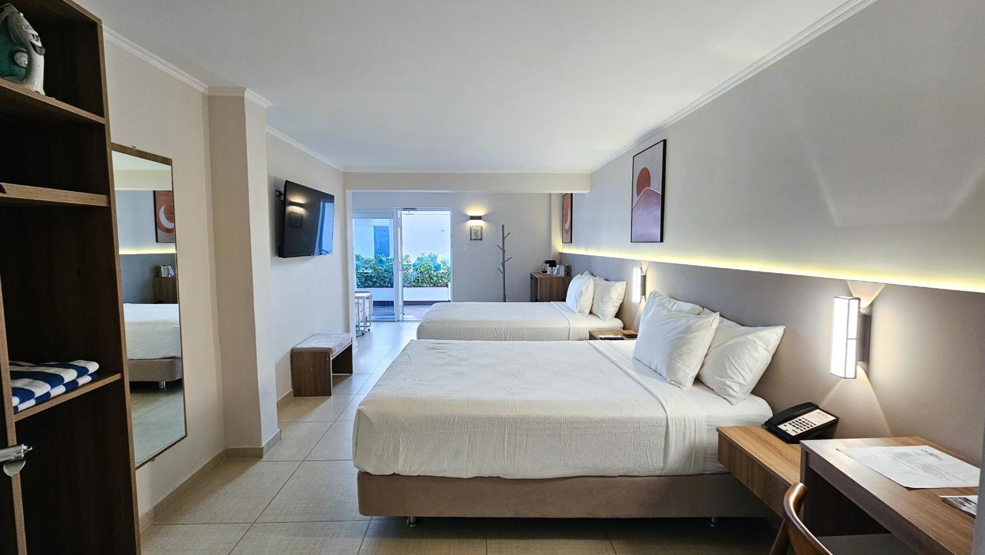 Double Room with Two Double Beds, Pool View and Sofa - Non-Smoking/Adults Only