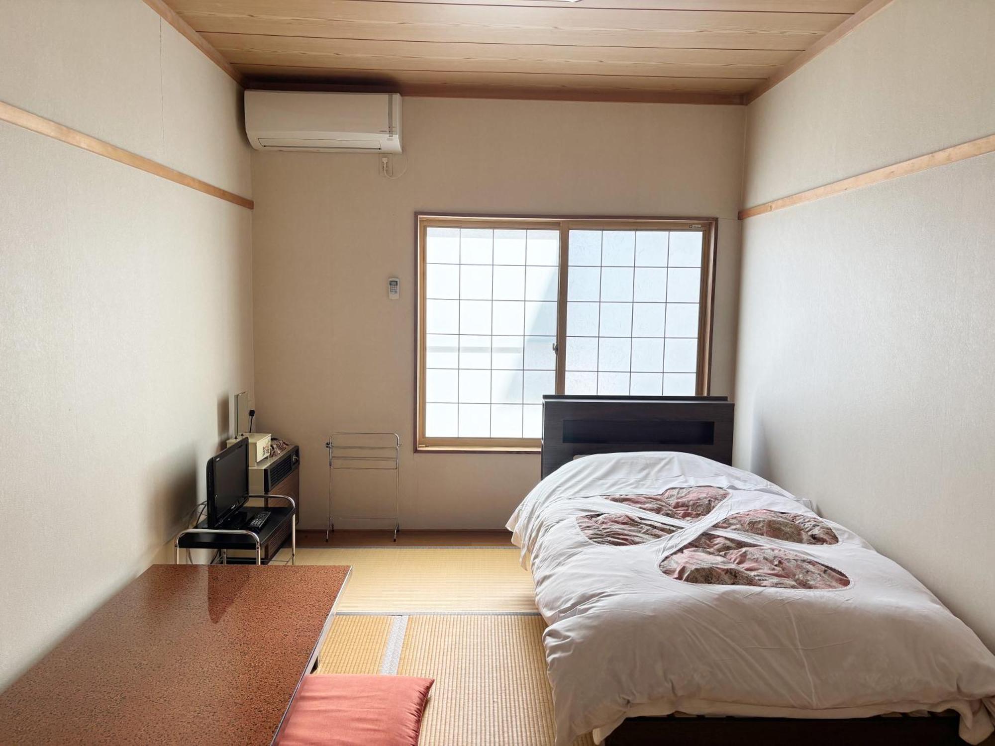 Single Room with Shared Shower and Toilet