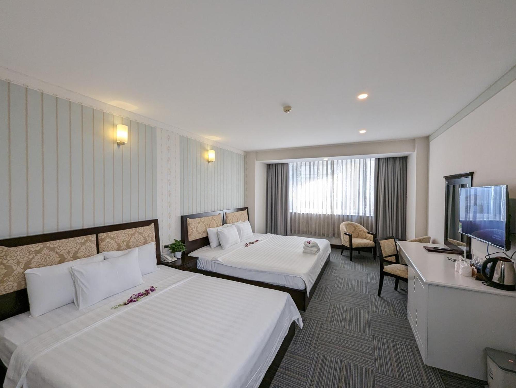 Deluxe Triple Room