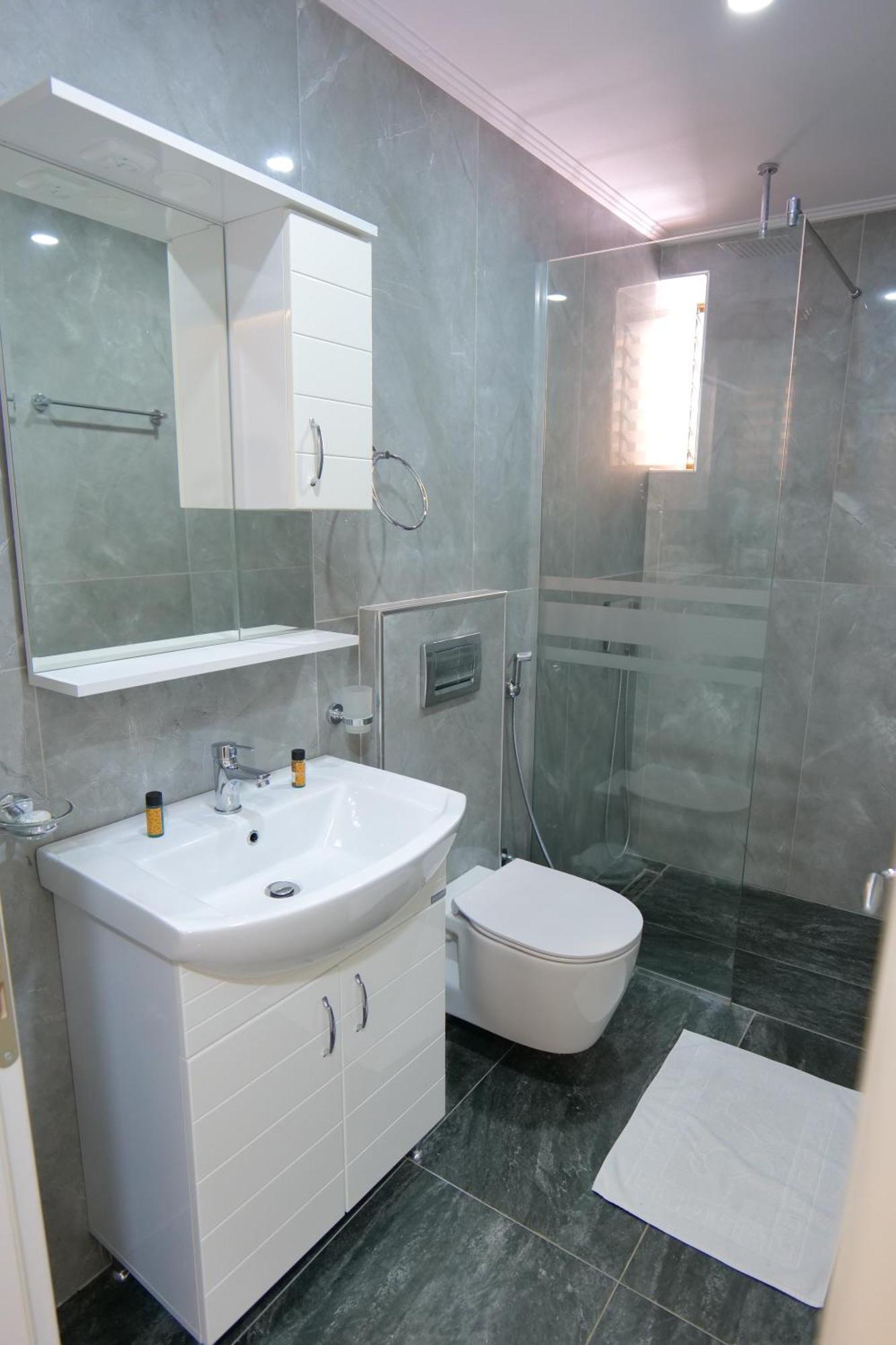 Quadruple Room with Side Sea View