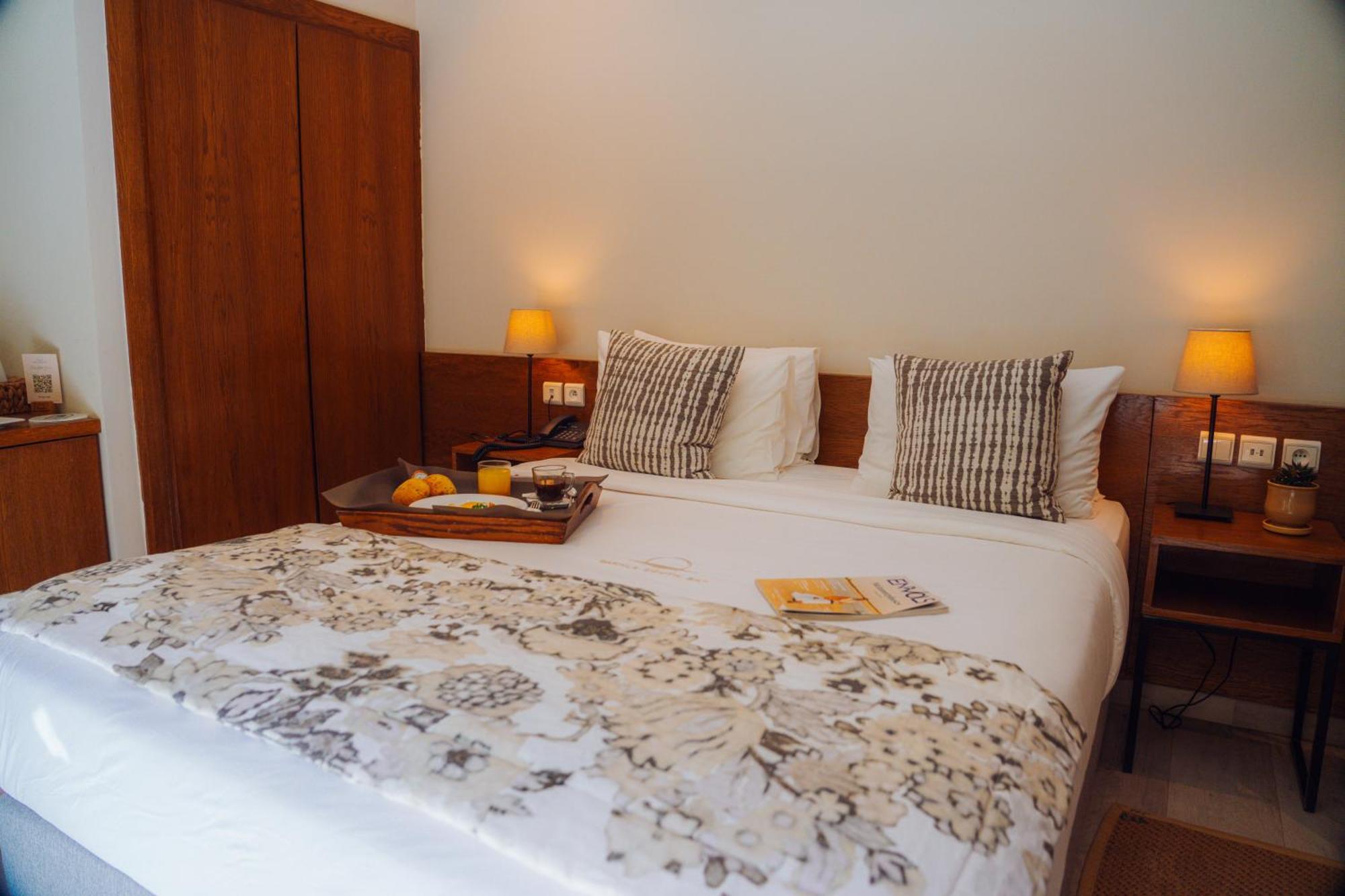 Standard Queen Room with Balcony and Street View - Non-Smoking