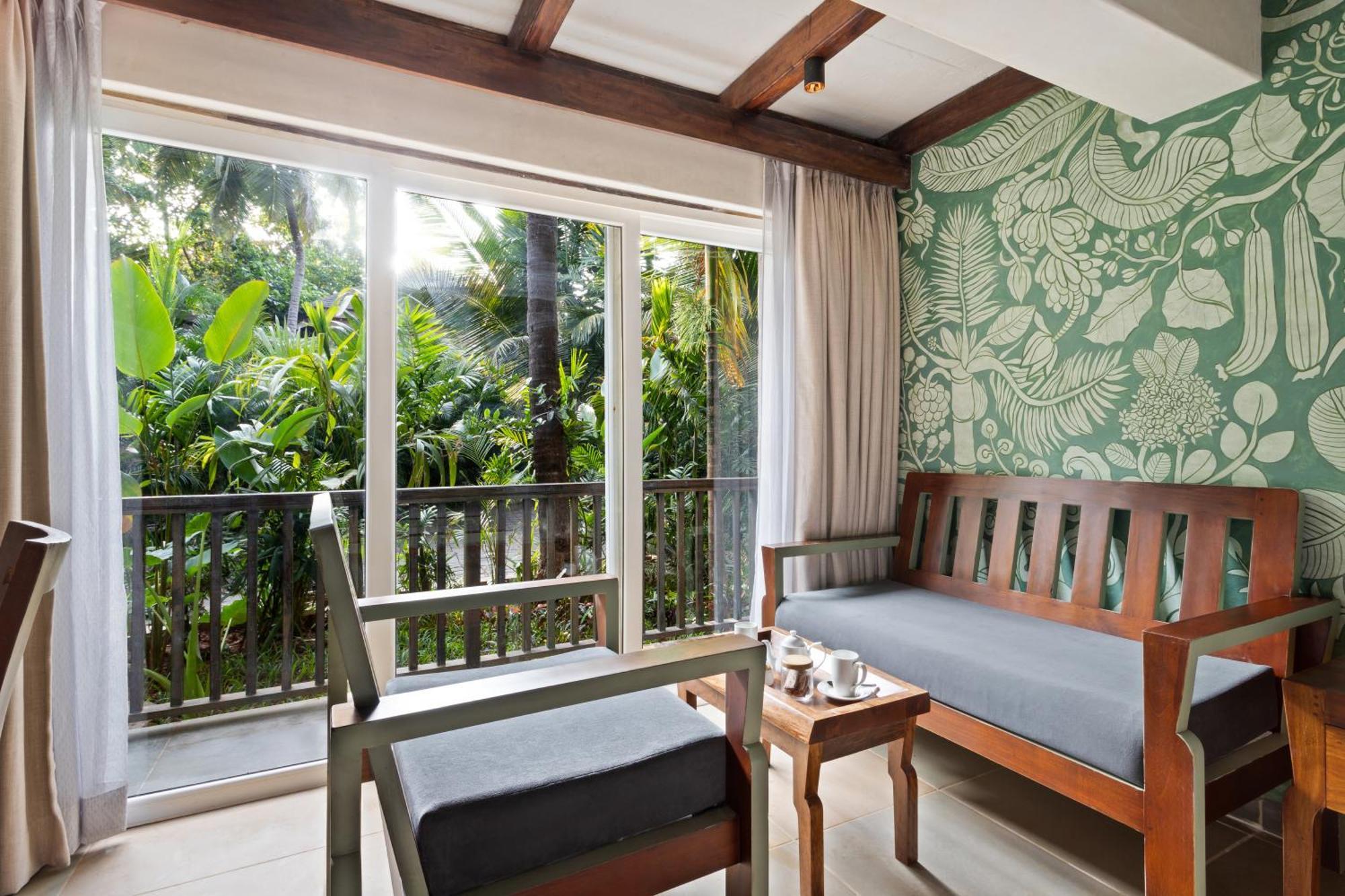 Deluxe Room with Balcony (with complimentary Kayaking and 20% off on Massage session) - Happy Hours (2+1) from 11 am to 8 pm on selected brands