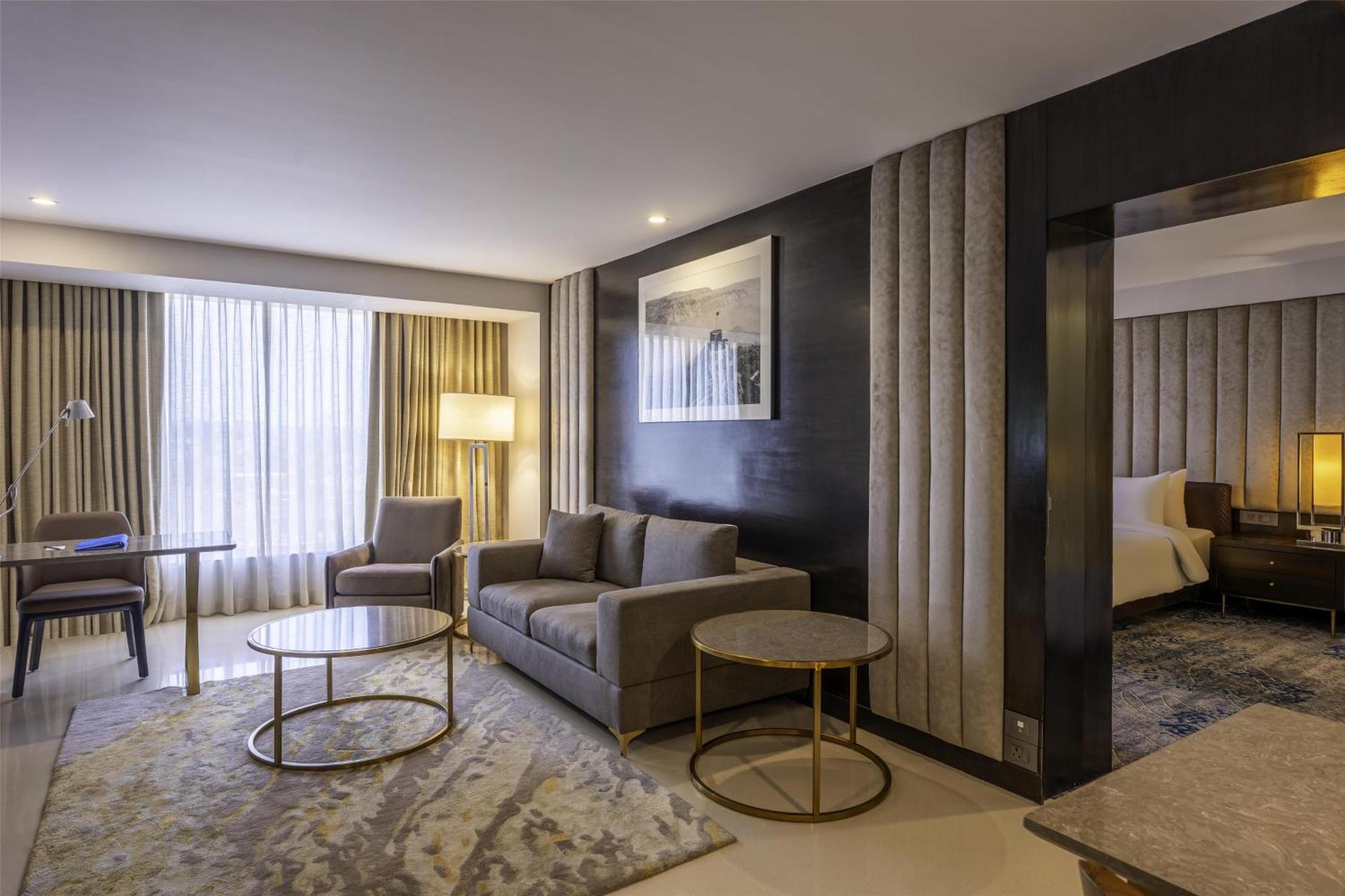 Junior Suite with Complimentary 2 IMFL Drinks , 2 Pieces of Laundry per stay and 20% discount on Spa.
