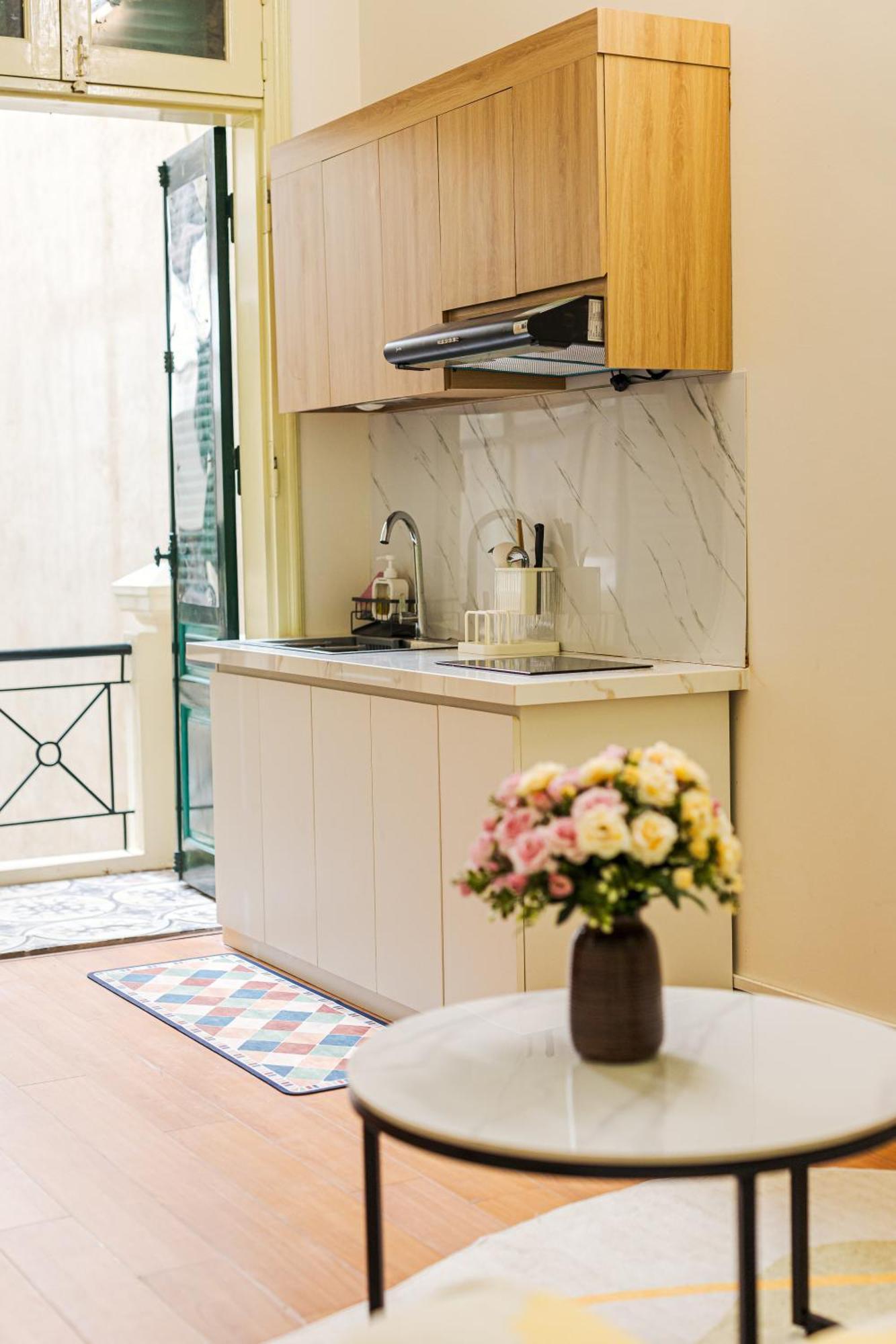 One-Bedroom Apartment with Balcony and City View