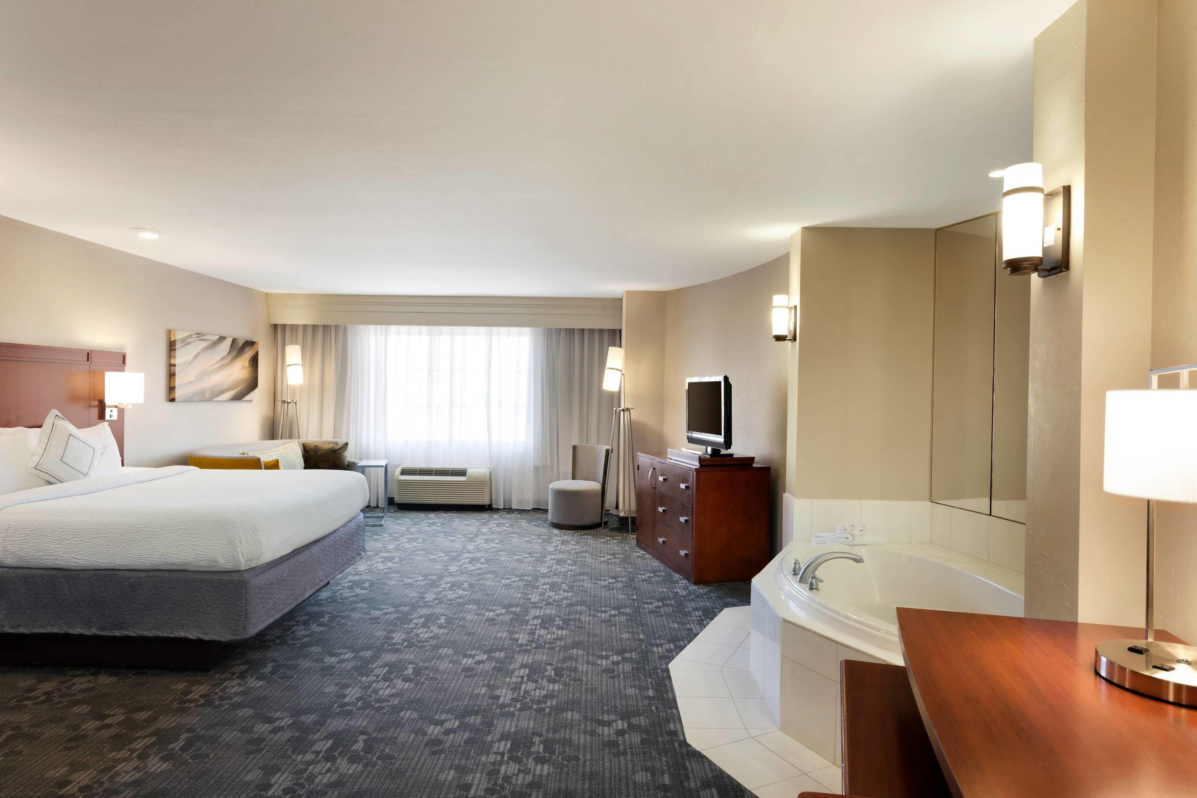 Larger Studio with One King Bed, One Set of Bunk Beds, Bathtub and Sofa Bed - Mobility Access/Hearing Accessible
