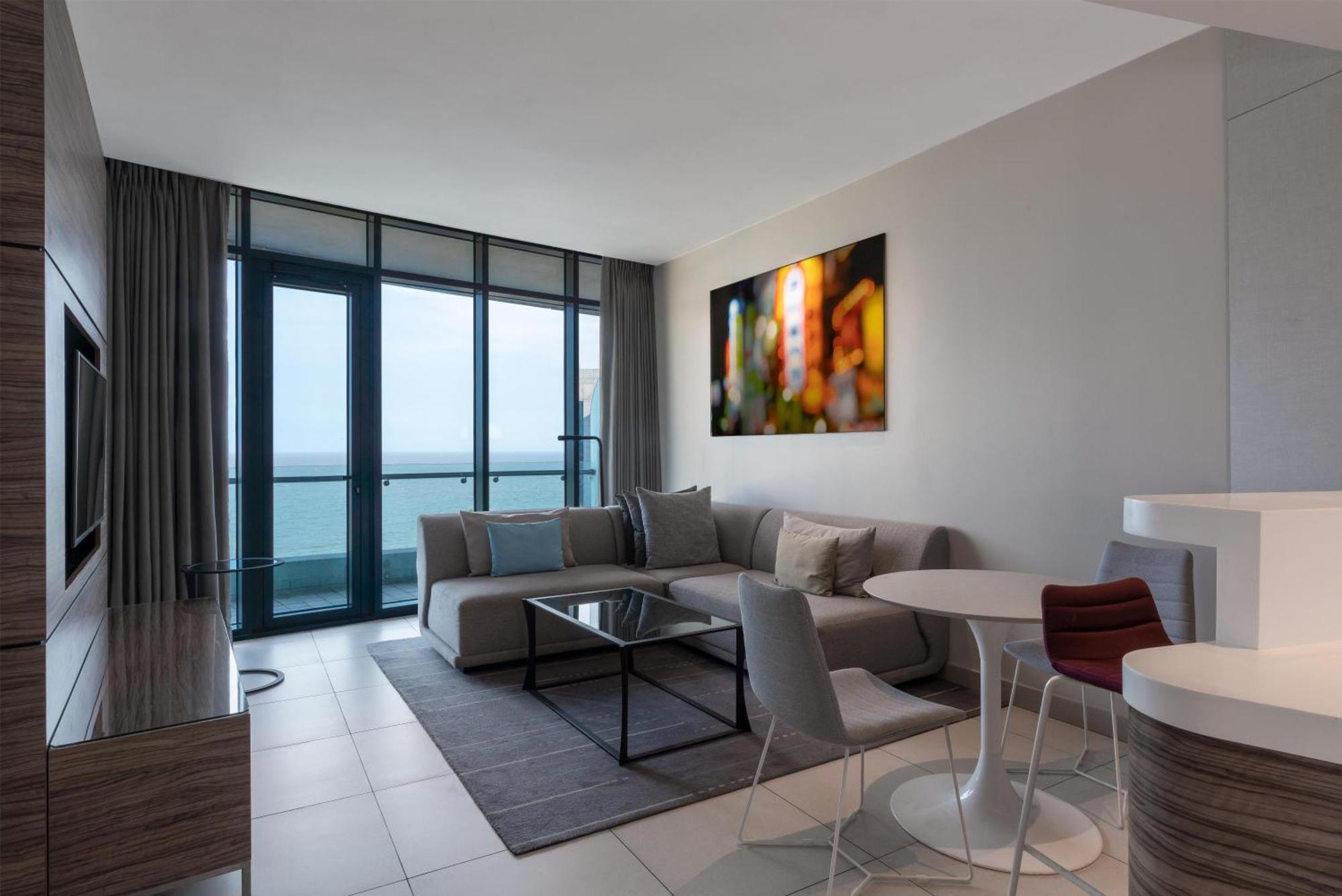 One-Bedroom Apartment with Balcony and Sea View