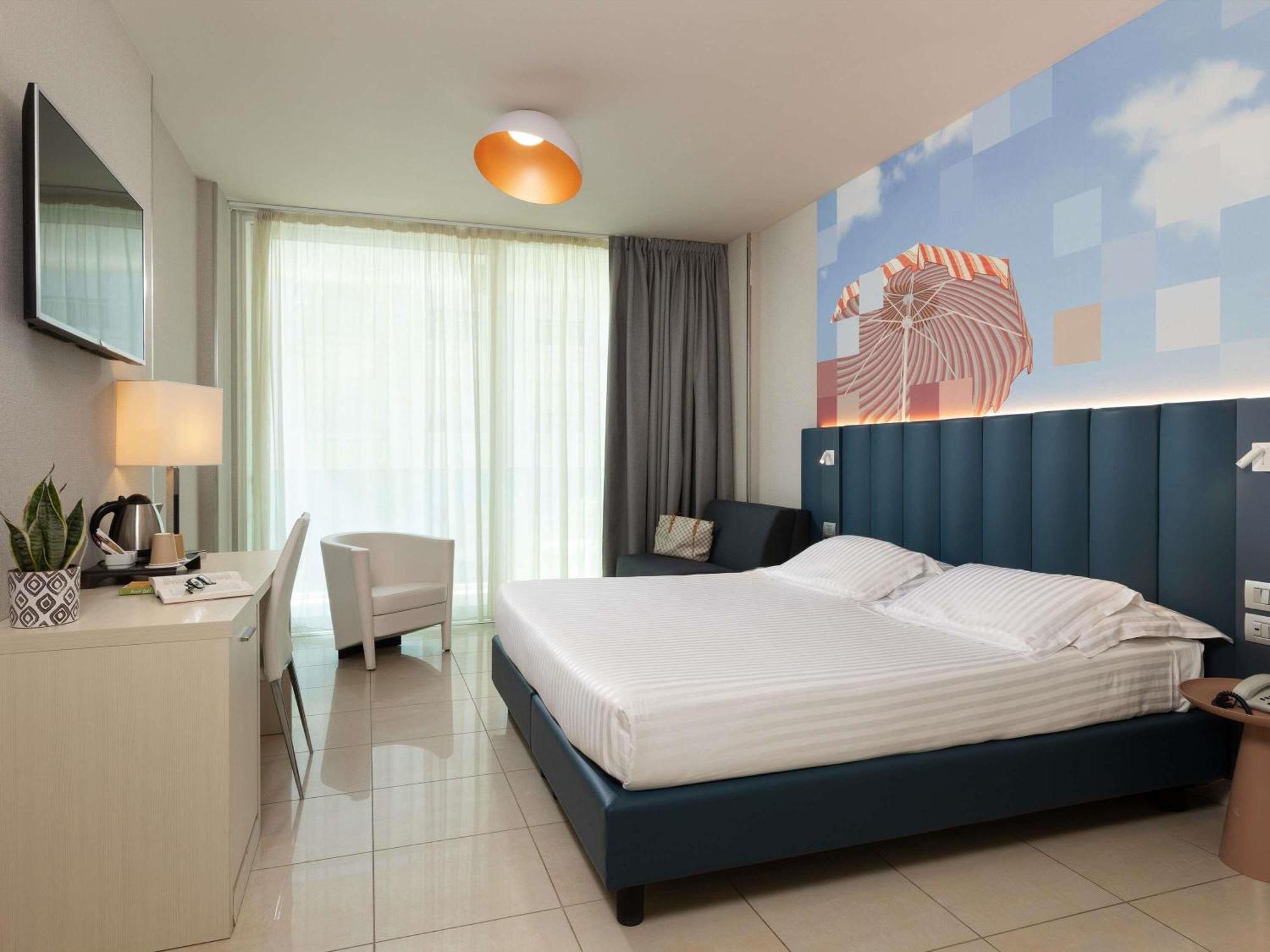 Superior Twin Room with Balcony and Side Sea View