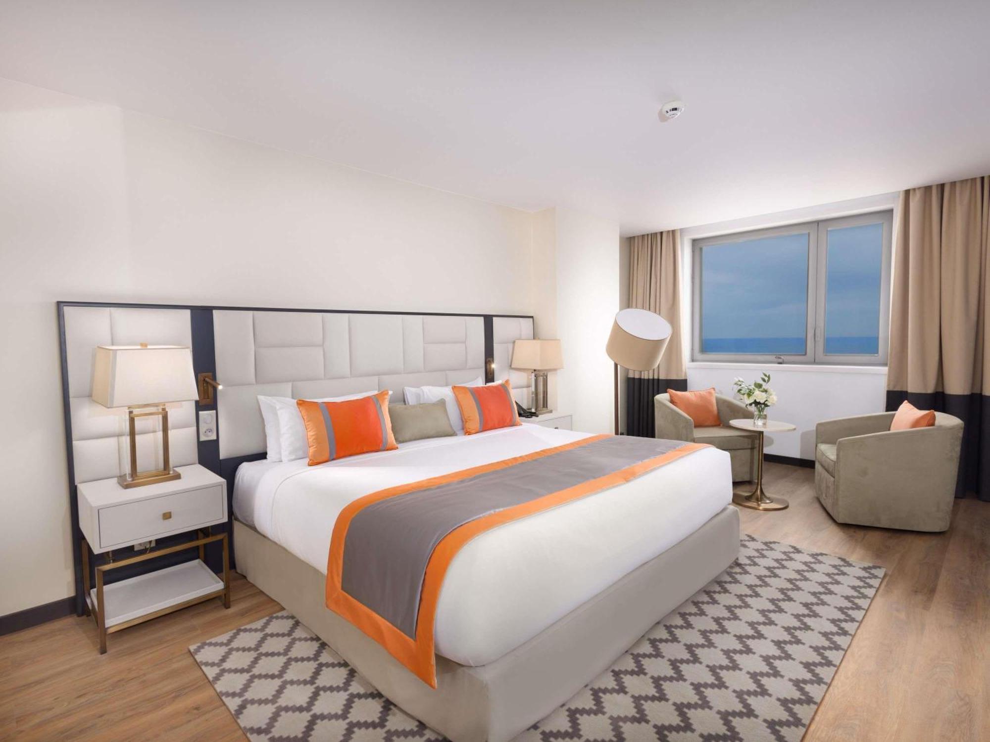 Junior King Suite with Sofa Bed and Ocean View