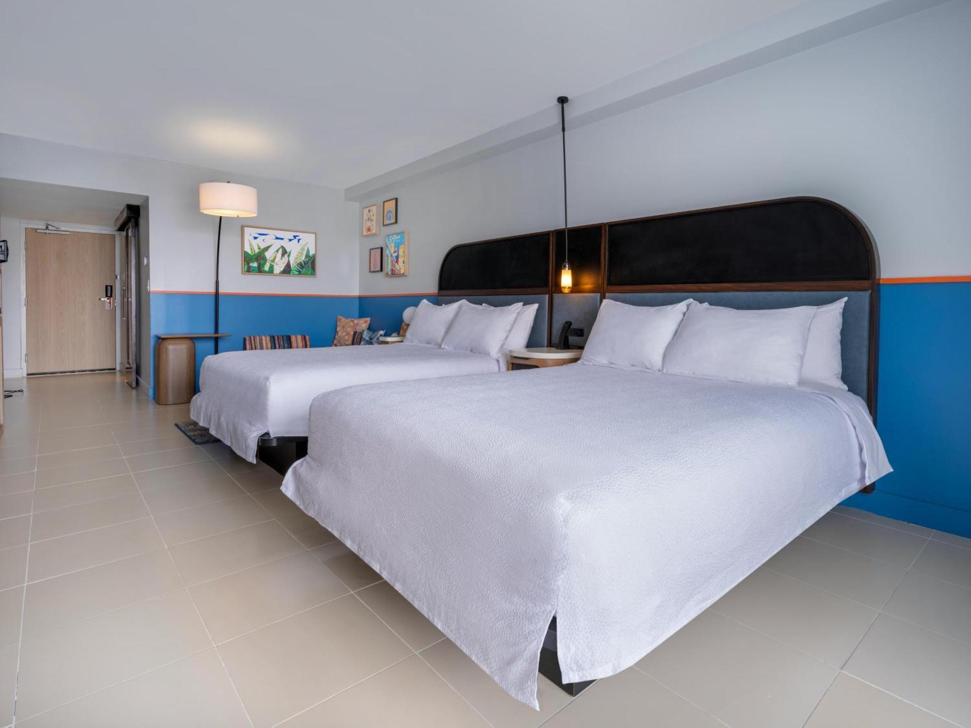 Deluxe Queen Room with Two Queen Beds and Balcony - Bay View