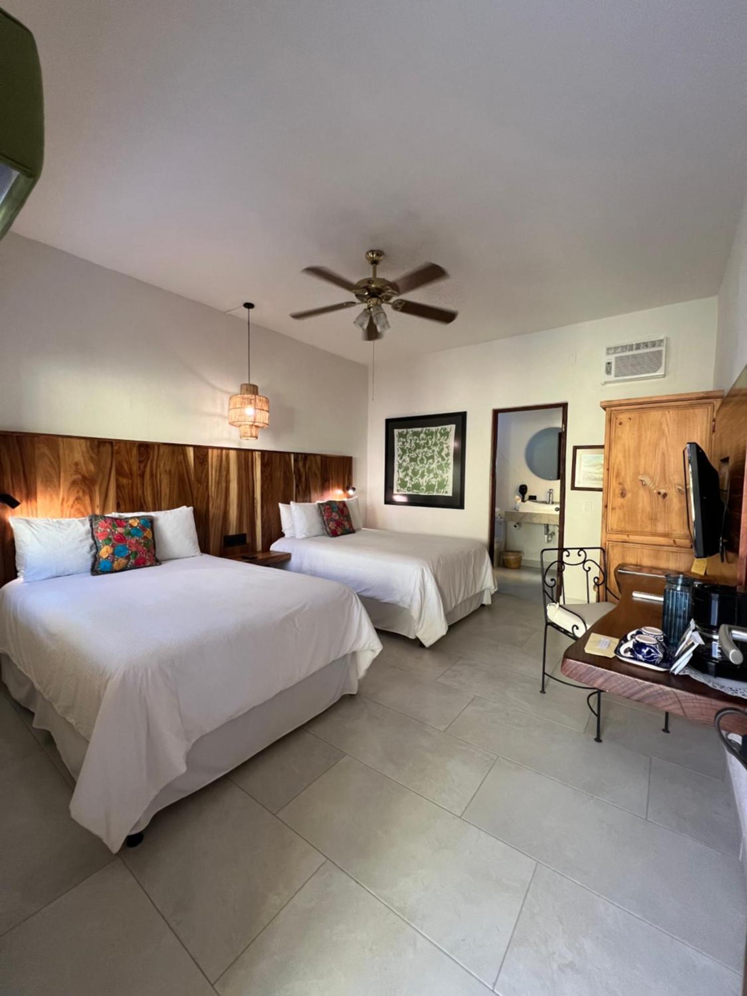 Standard Room with Two Double Beds (across the street)