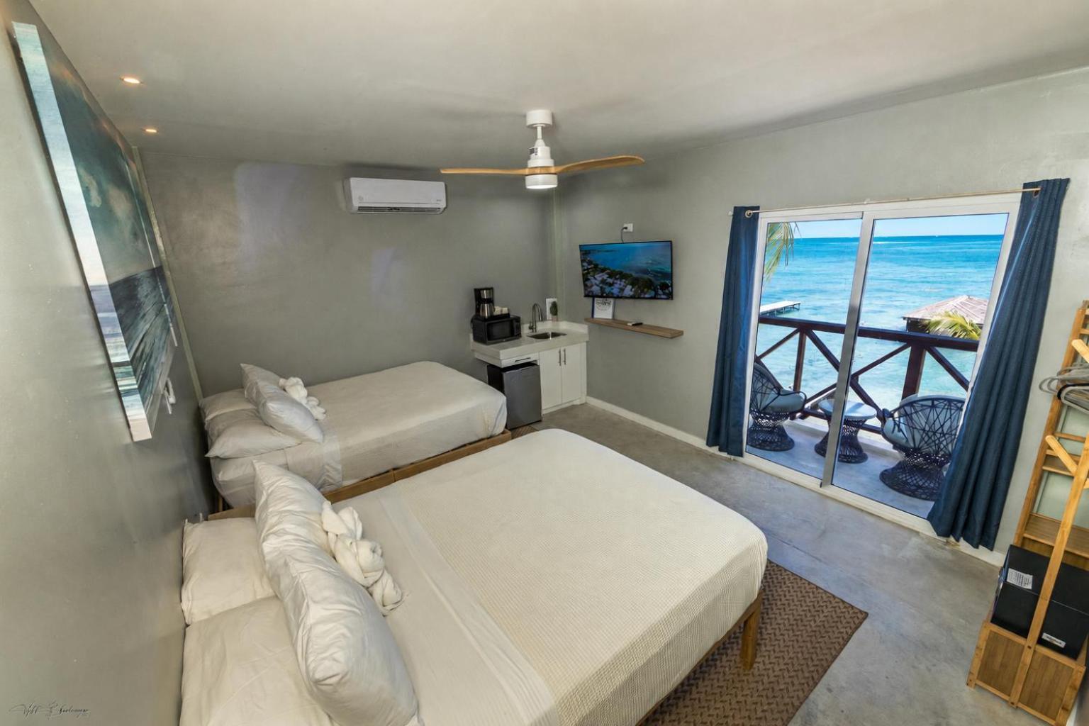 Quadruple Room Beachfront with Balcony
