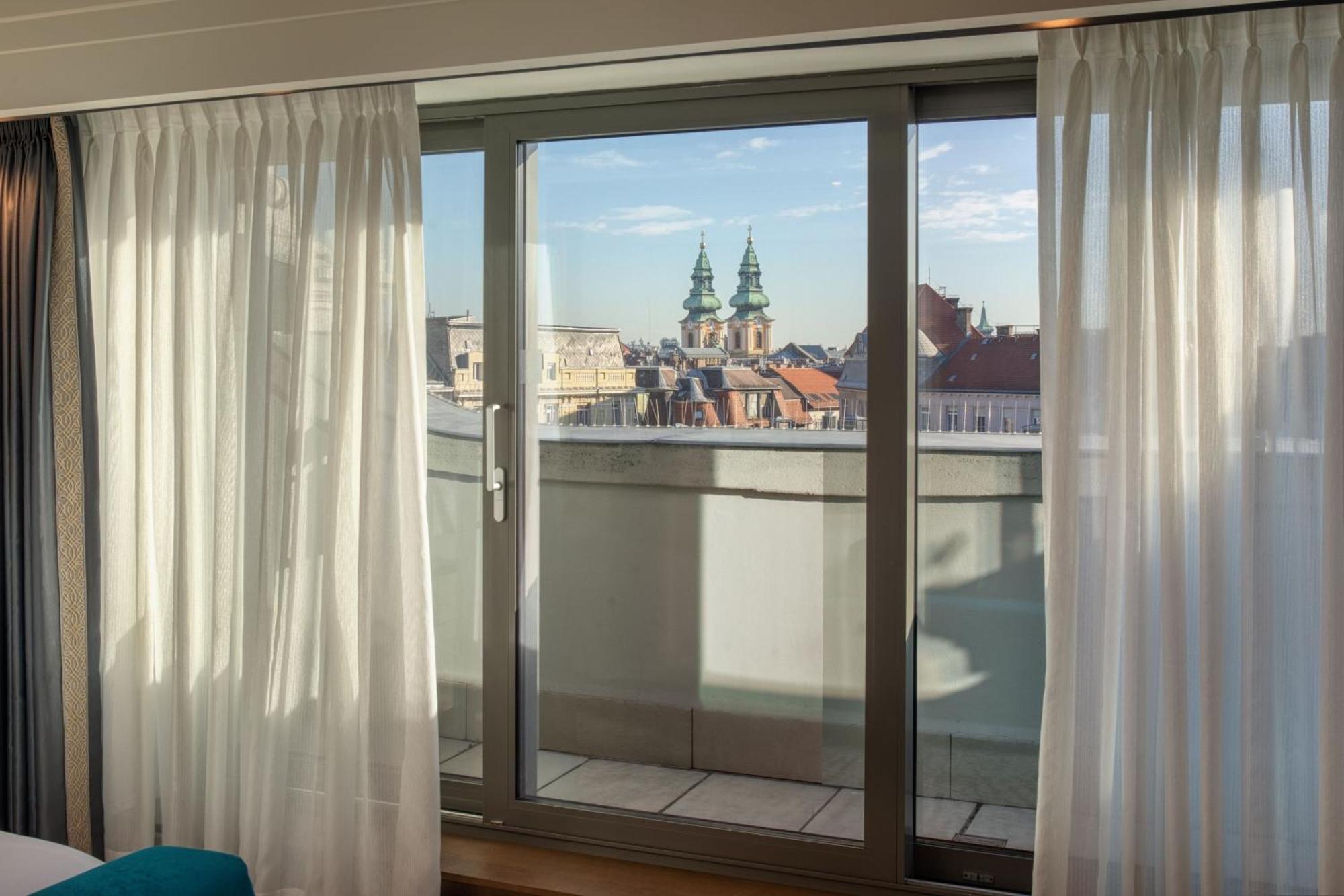 King Room with Balcony - City View