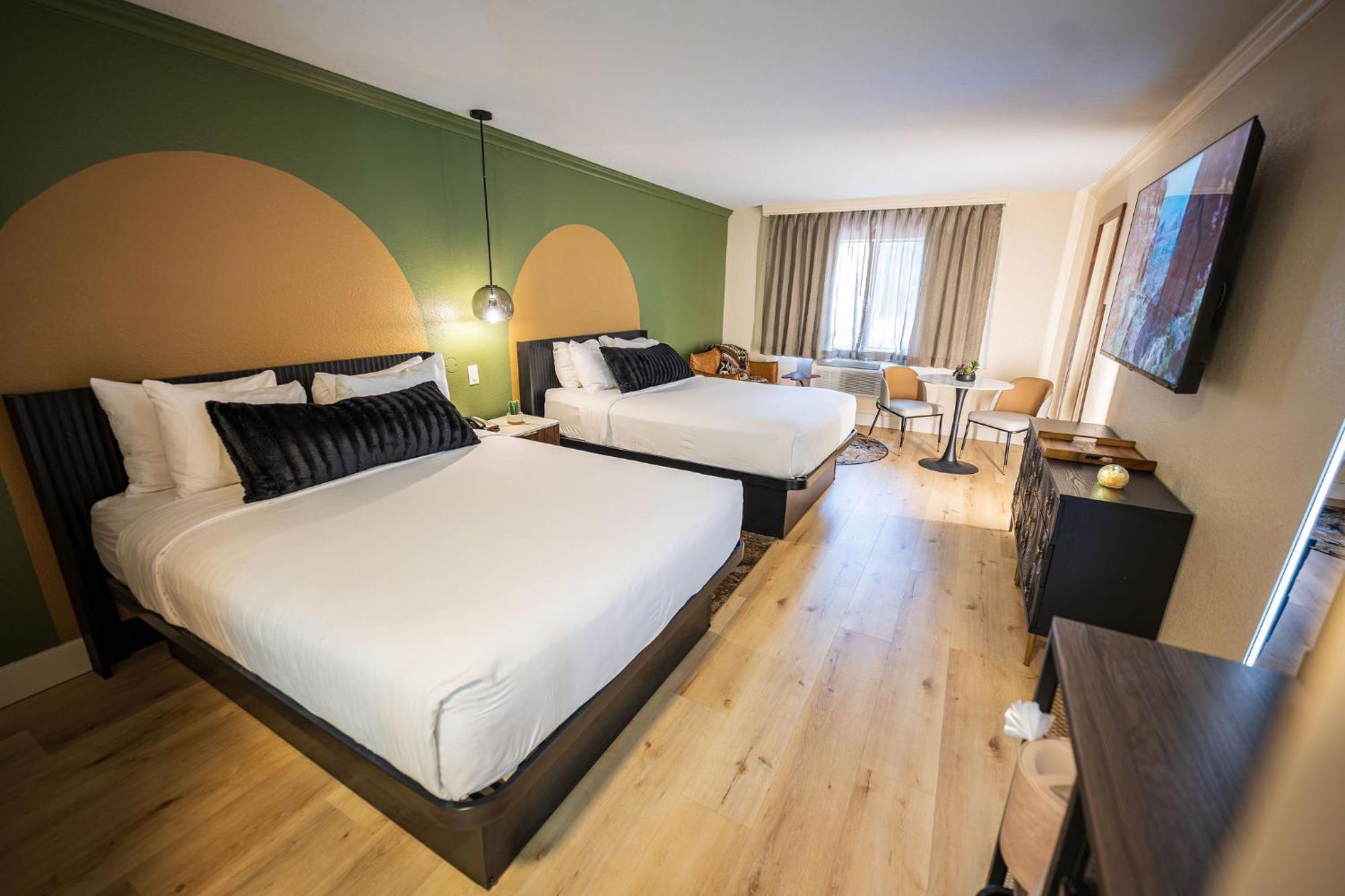 Room with Two Queen Beds and Sofa