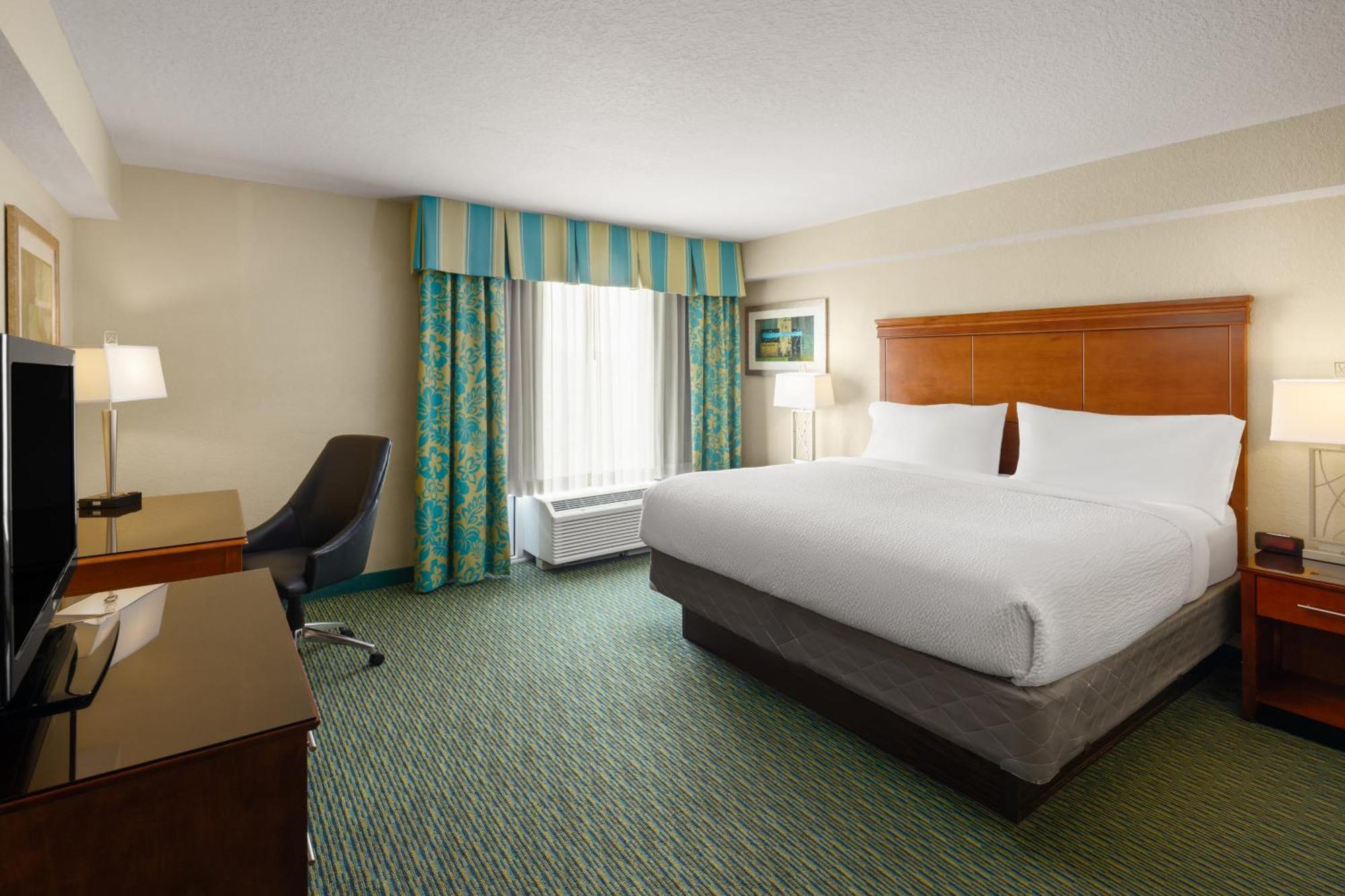 King Suite with Two Bunk Beds and Pool View