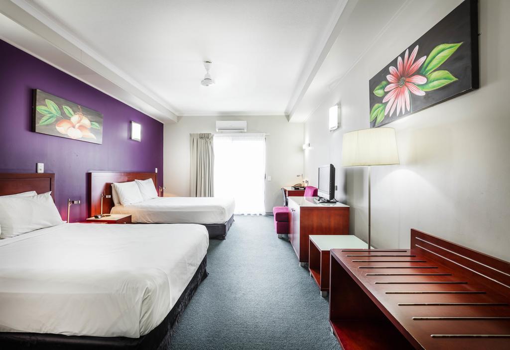 Room with Twin and Queen Beds and Pool View