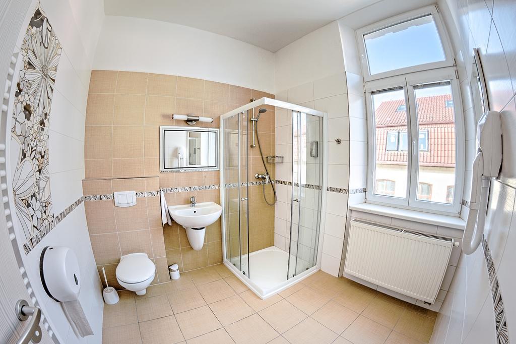 Quadruple Room with Private Toliet and Shared Bathroom