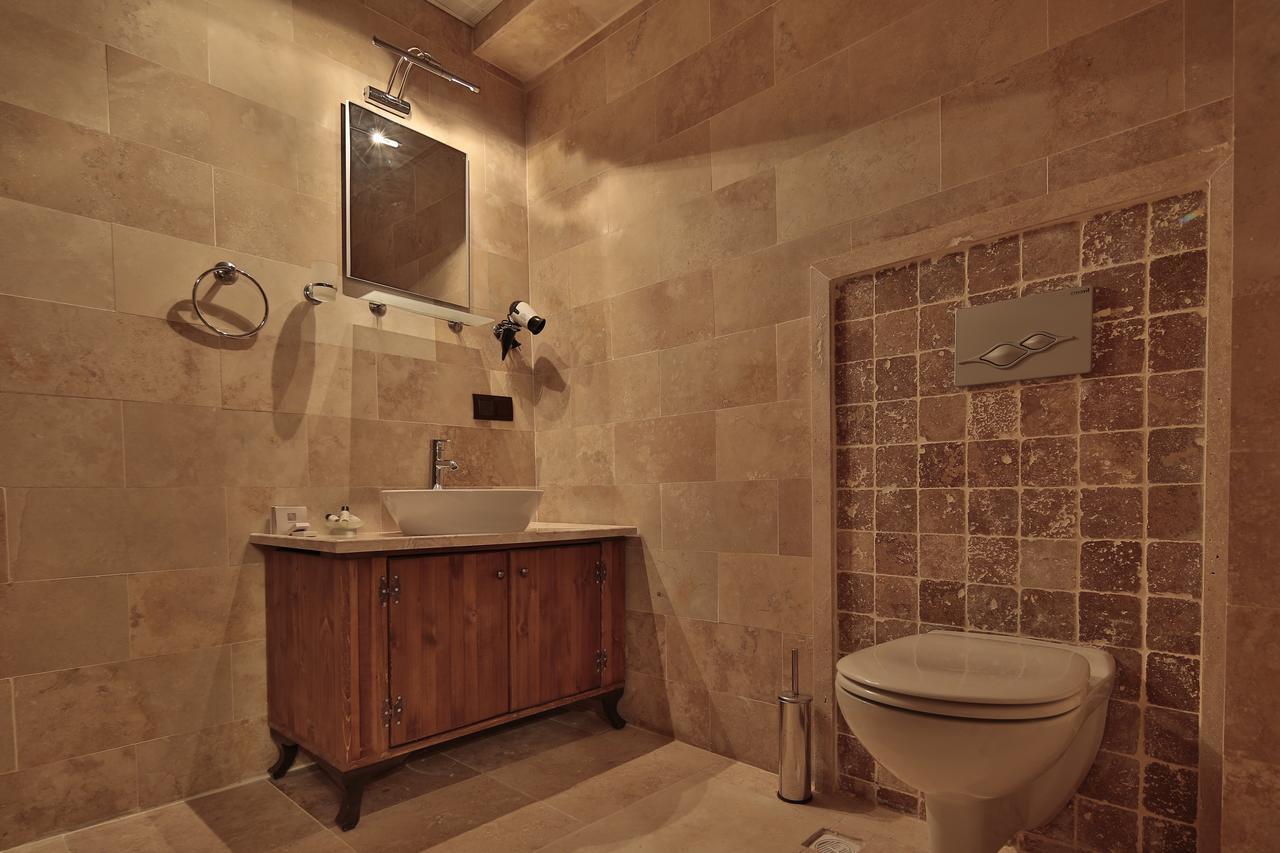Deluxe Triple Stone Room with Courtyard View