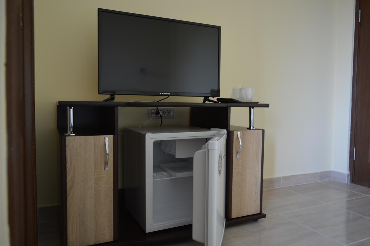 Family Room (2 Adults + 1 Child up to 14 years old)