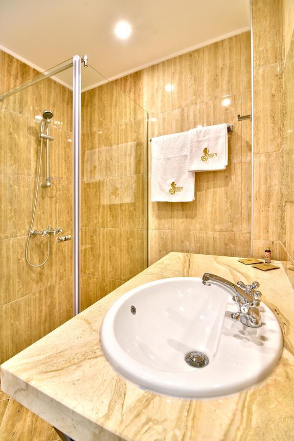 Three-Bedroom Apartment with Sea View
