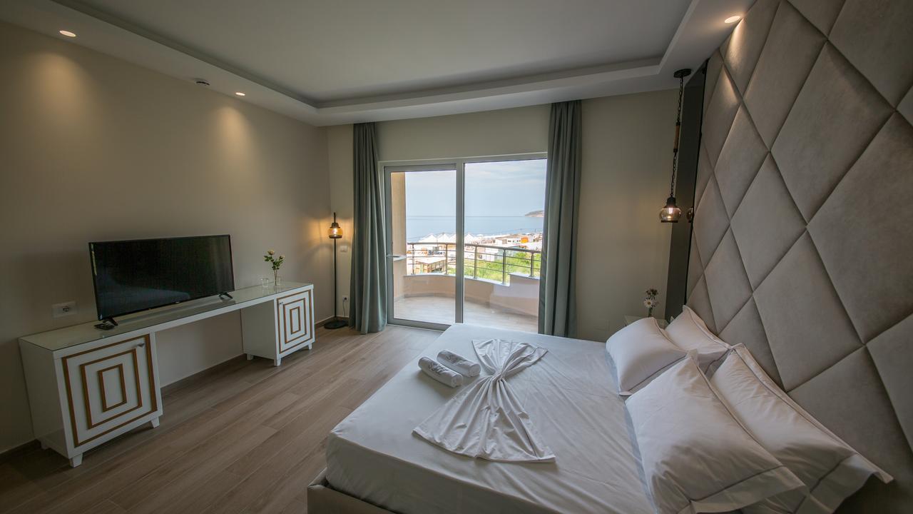 Deluxe Triple Room with Balcony and Side Sea View