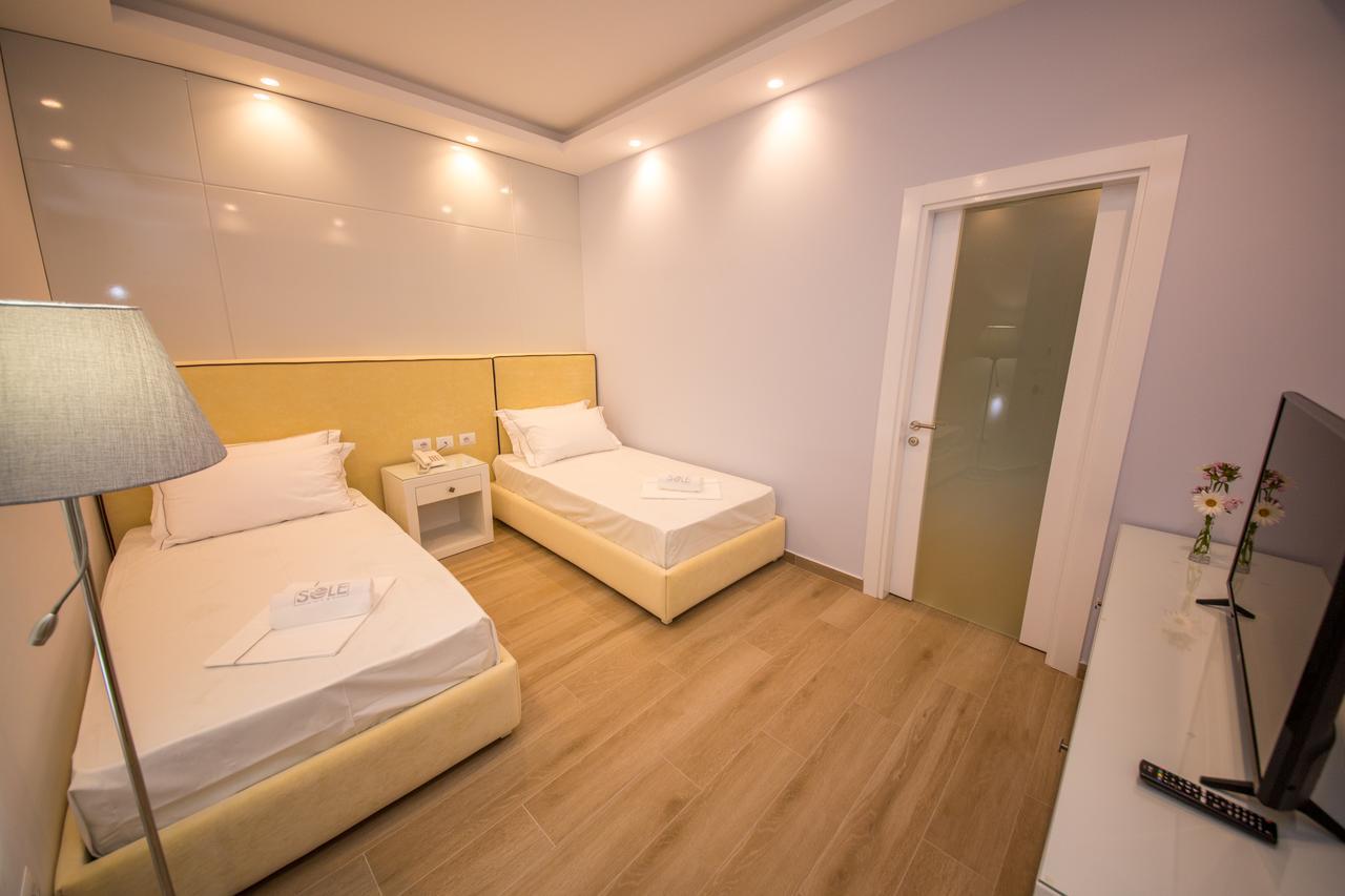 Deluxe Family Suite with Balcony and Side Sea View