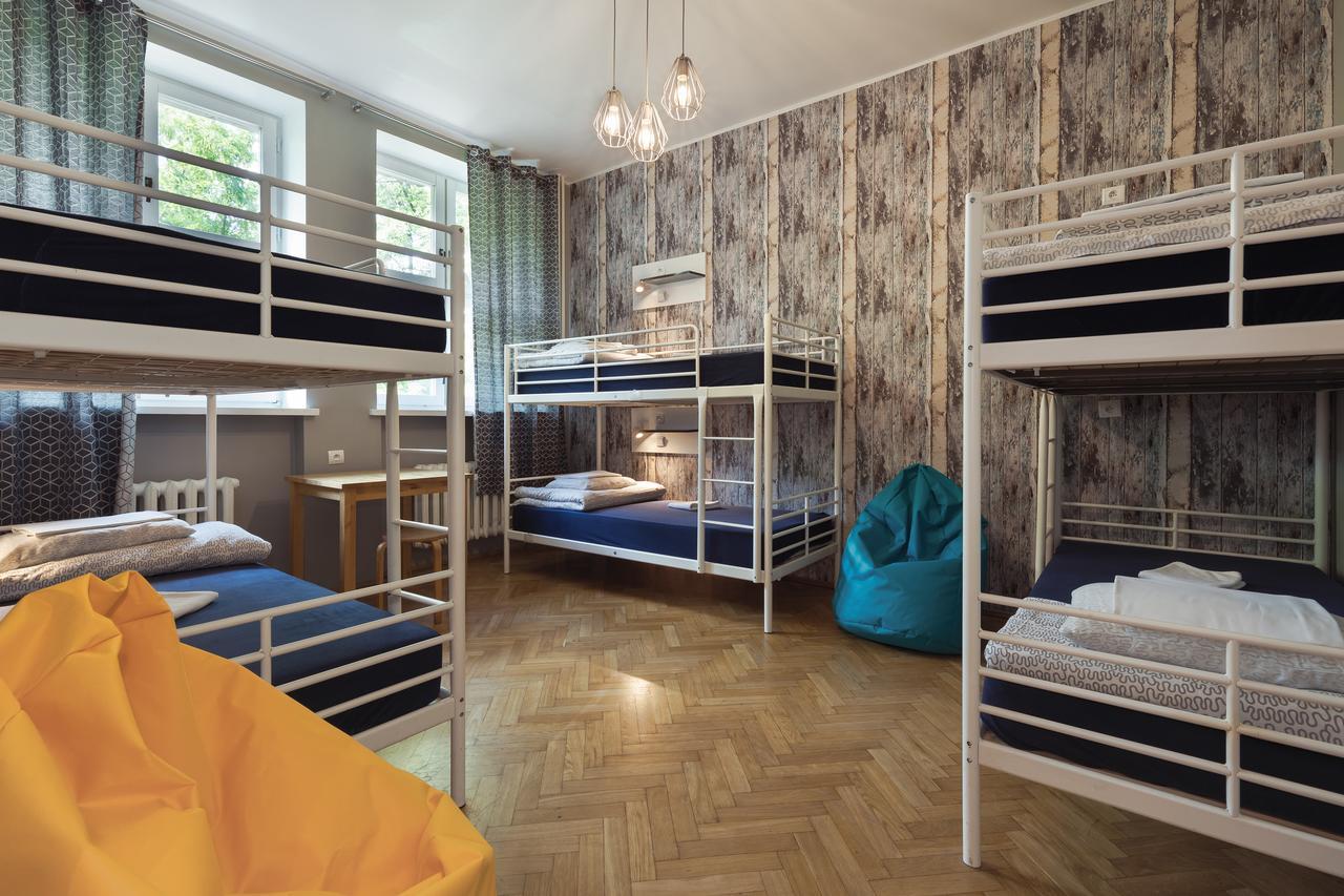 Bed in 6-Bed Dormitory Room with Shared Bathroom