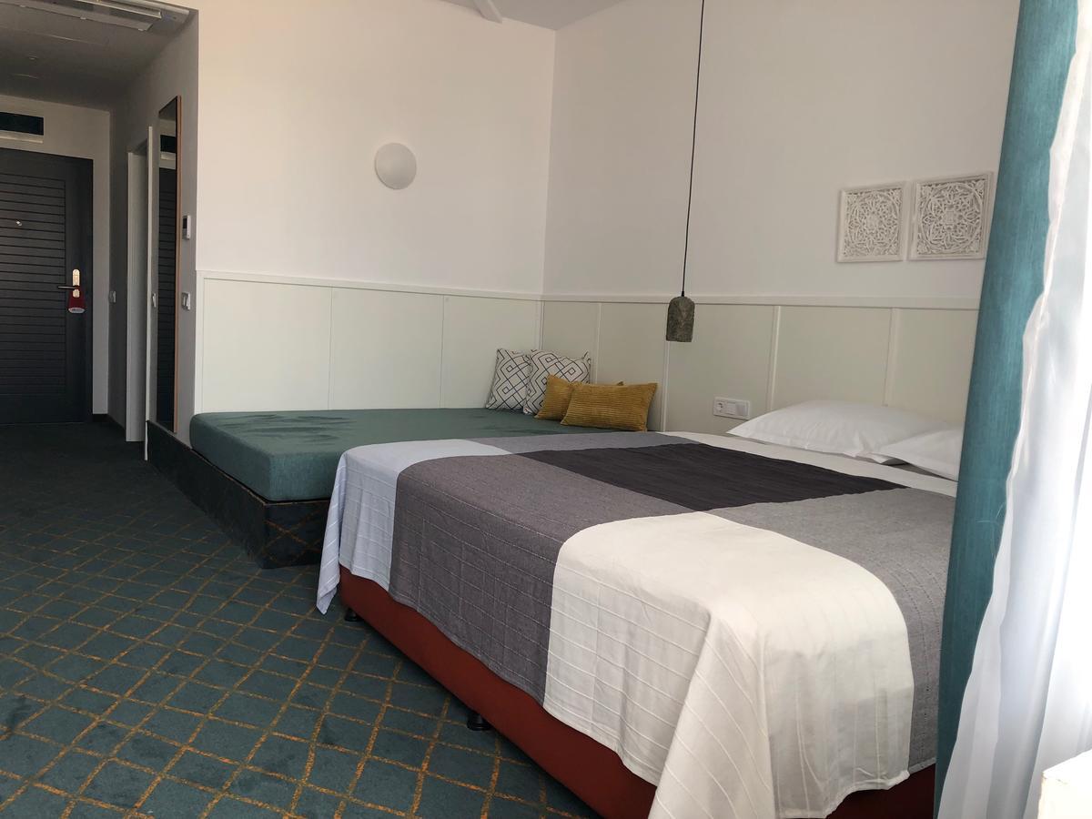 Double Room with Side Sea View (3 Adults)