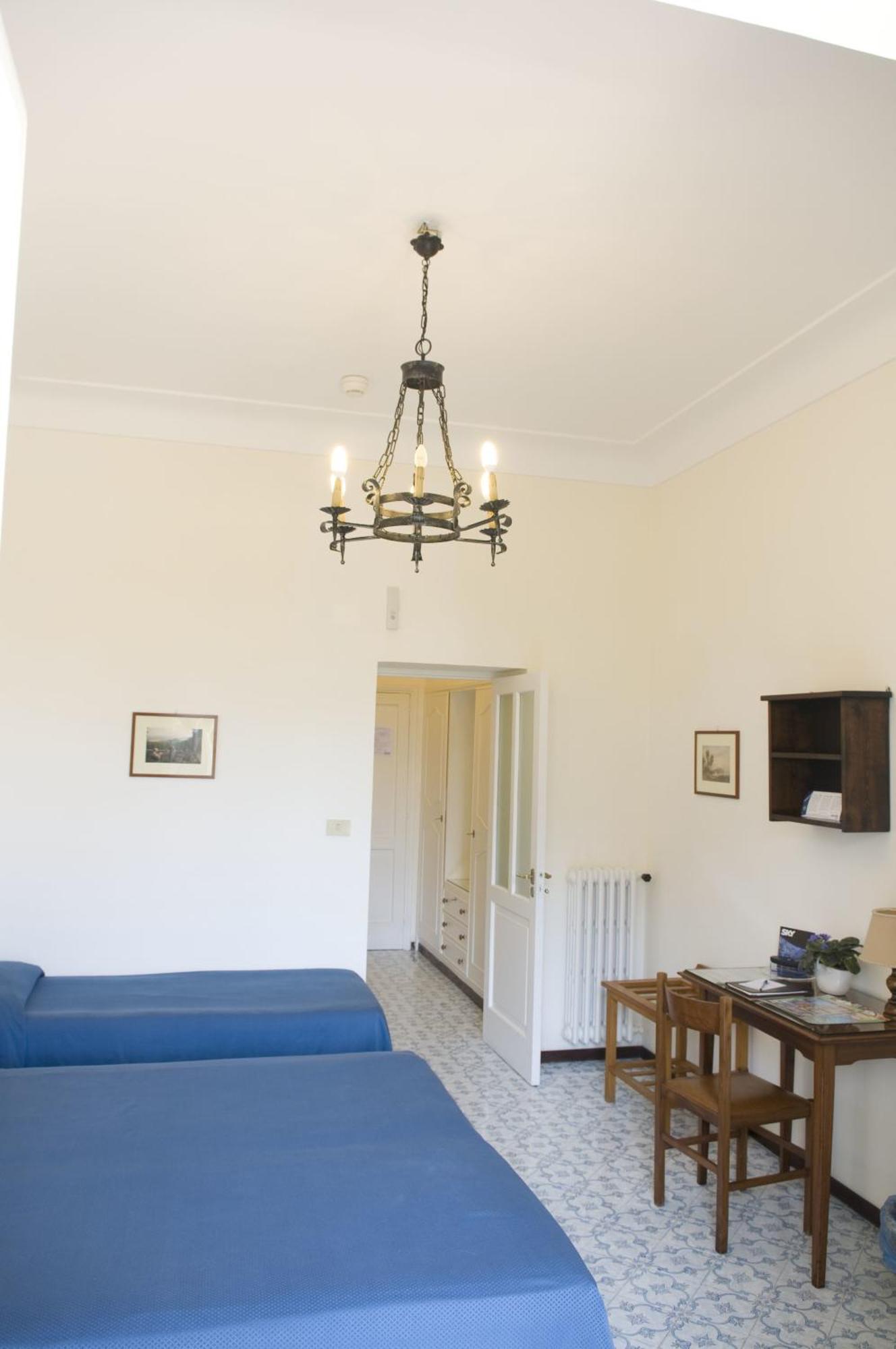 Superior Triple Room with Balcony and Garden View