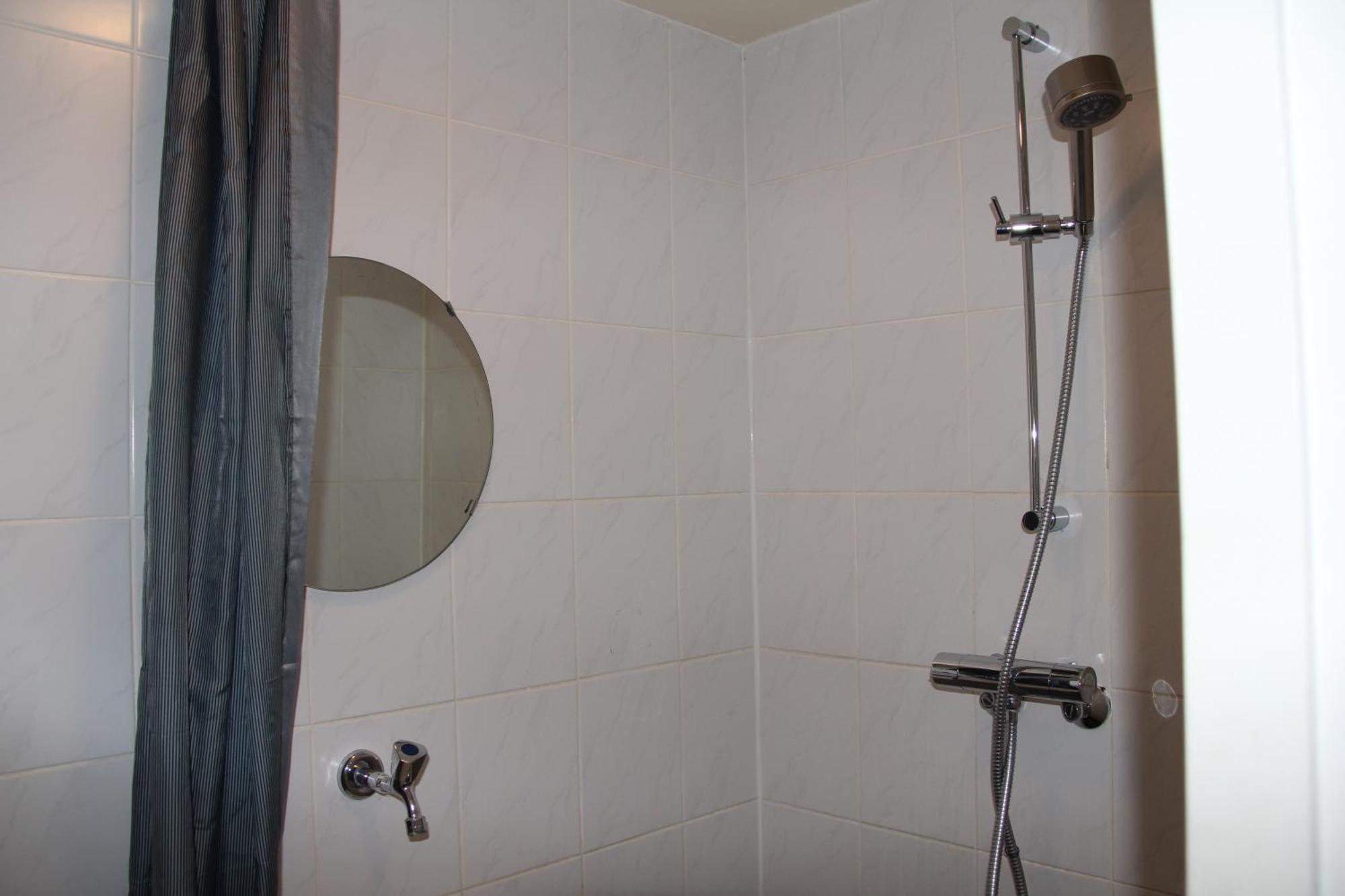 Basic Single Room with Shared Bathroom